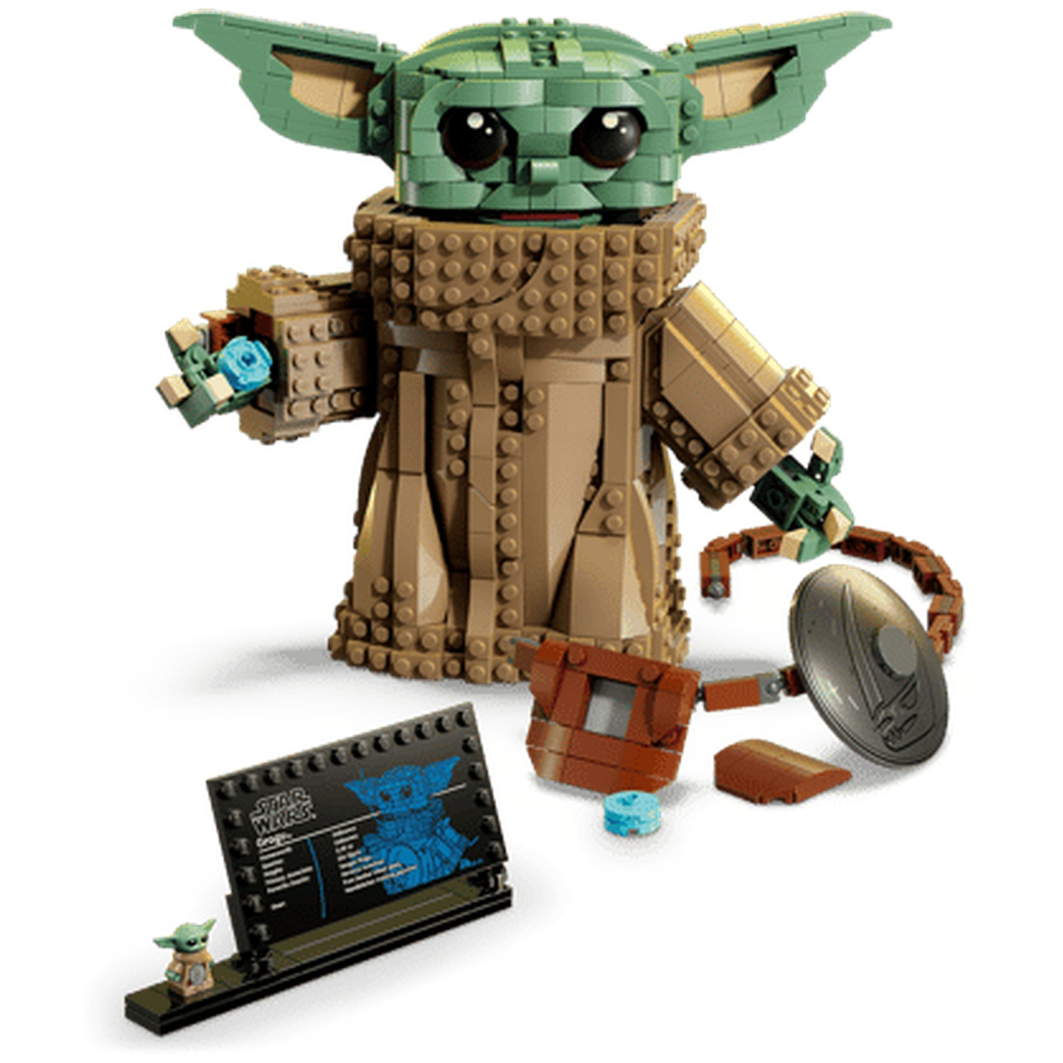 A Lego model of Baby Yoda holds a blue object in its hand.