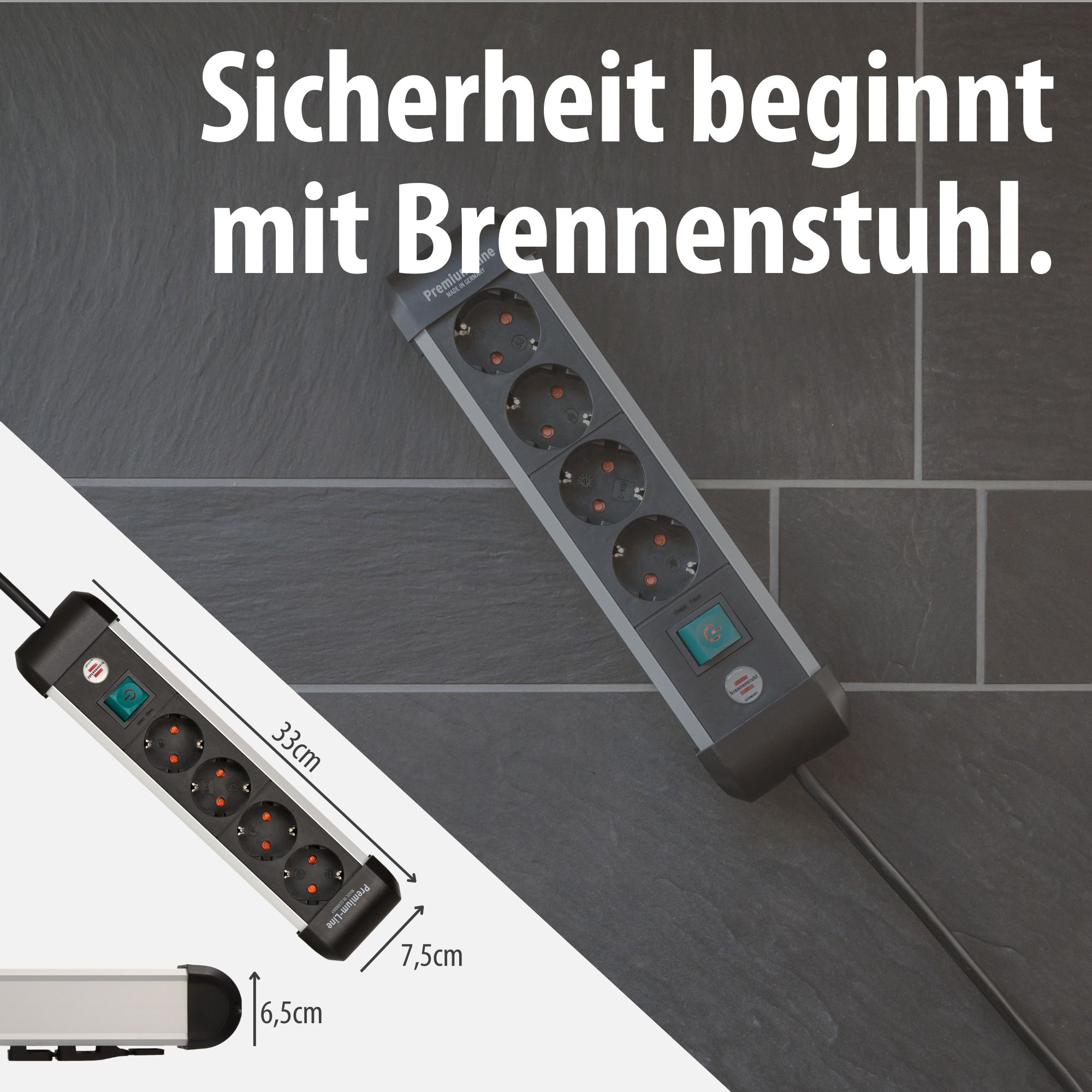 Eine graue Steckdosenleiste mit 6 Steckplätzen und Schalter auf dunklem Untergrund.