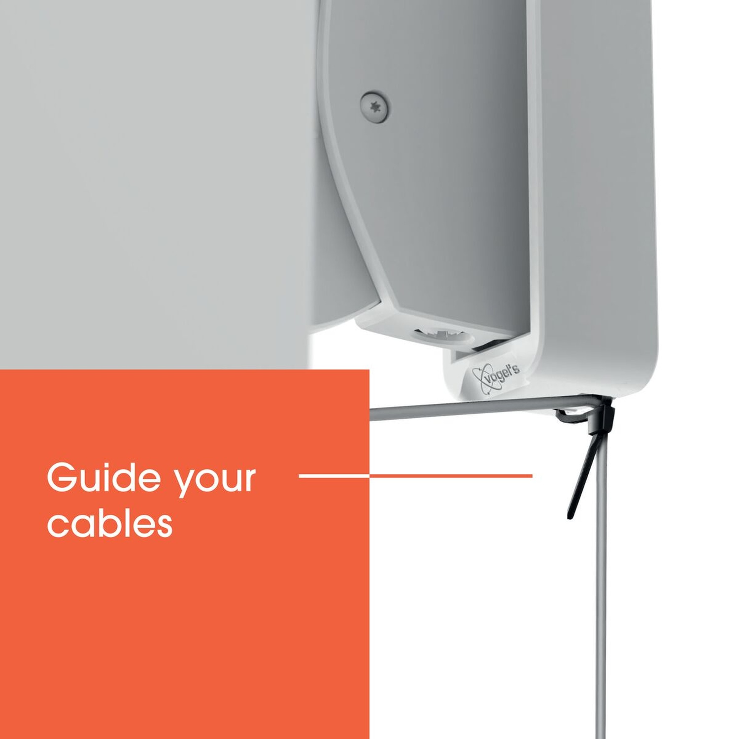 Accessoire de gestion de câbles Vogel's gris avec texte 'Guide your cables'.