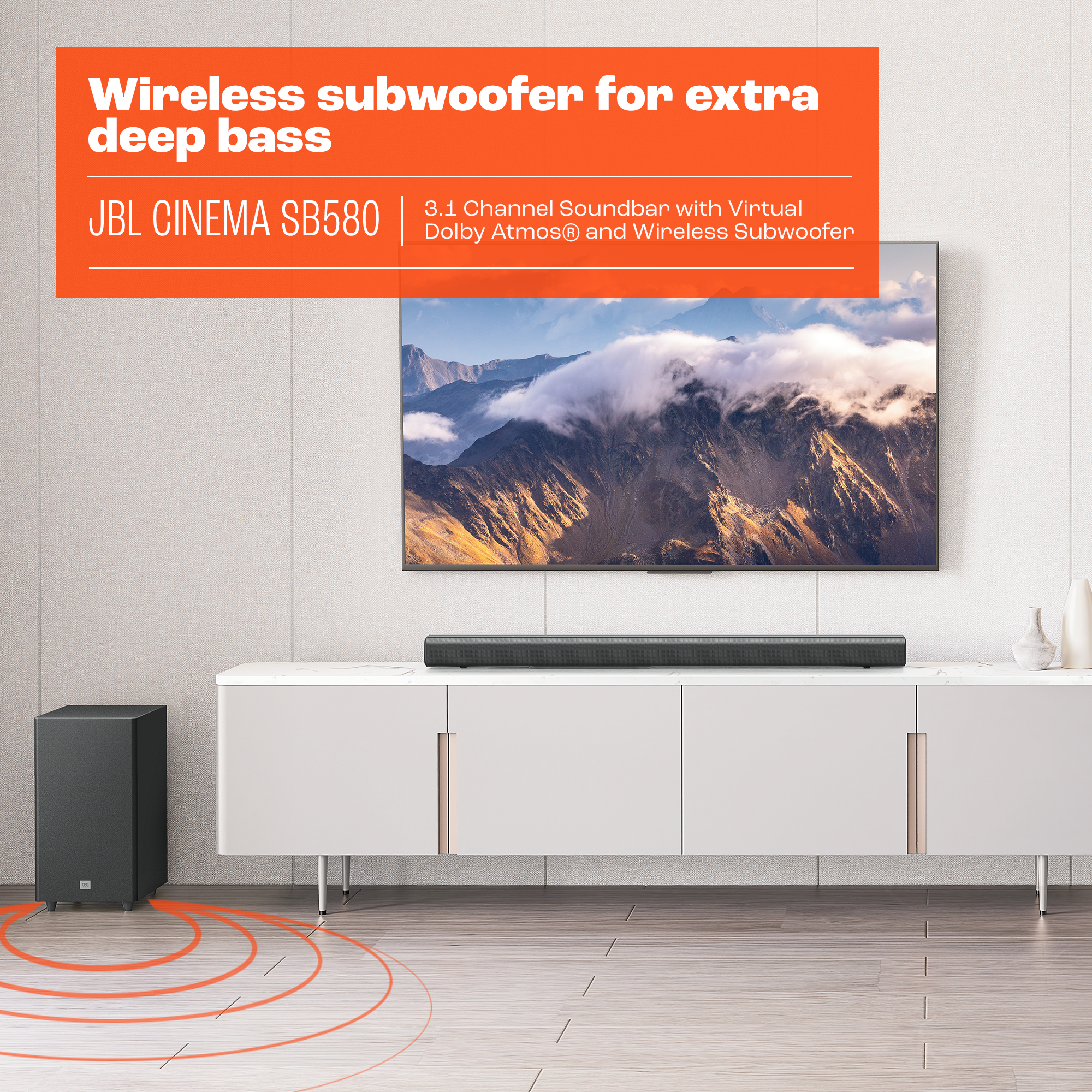 Dağ manzaralı siyah subwoofer, sesli çubuk ve TV.