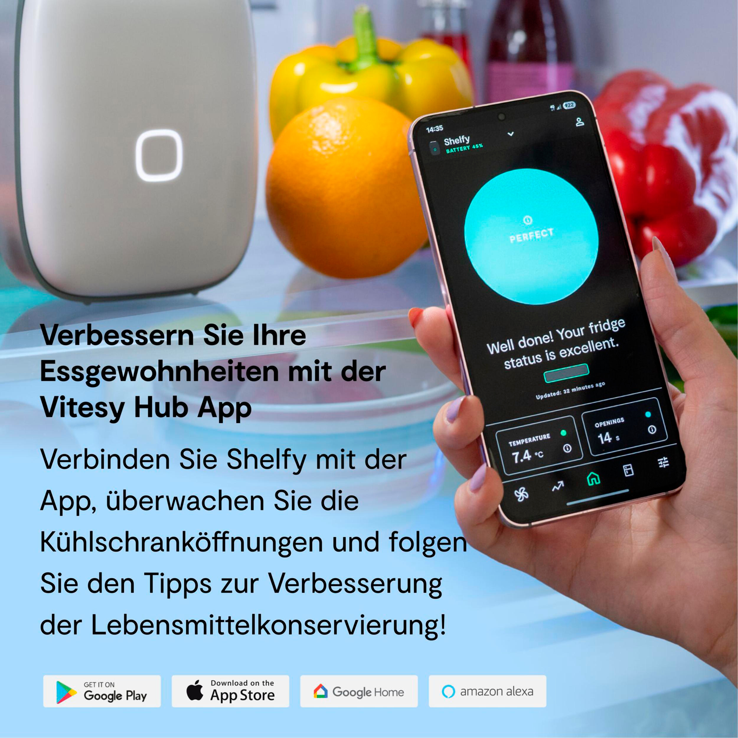 Ein Smartphone zeigt eine Kühlschrank-App mit Obst und Gemüse im Hintergrund.