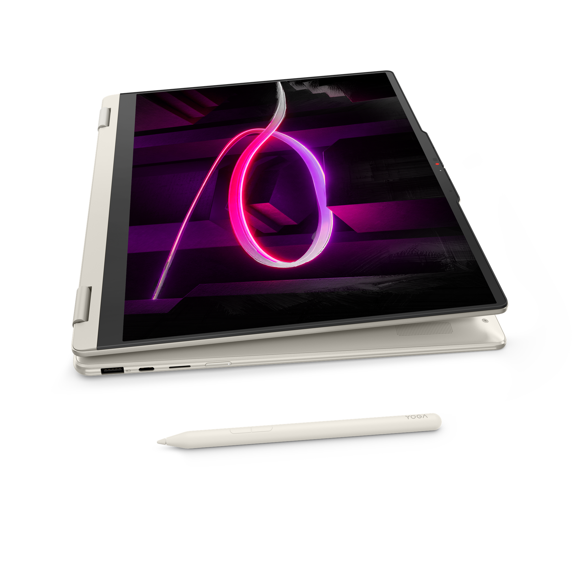 Ein beiger Laptop mit Stift auf schwarzem Hintergrund.