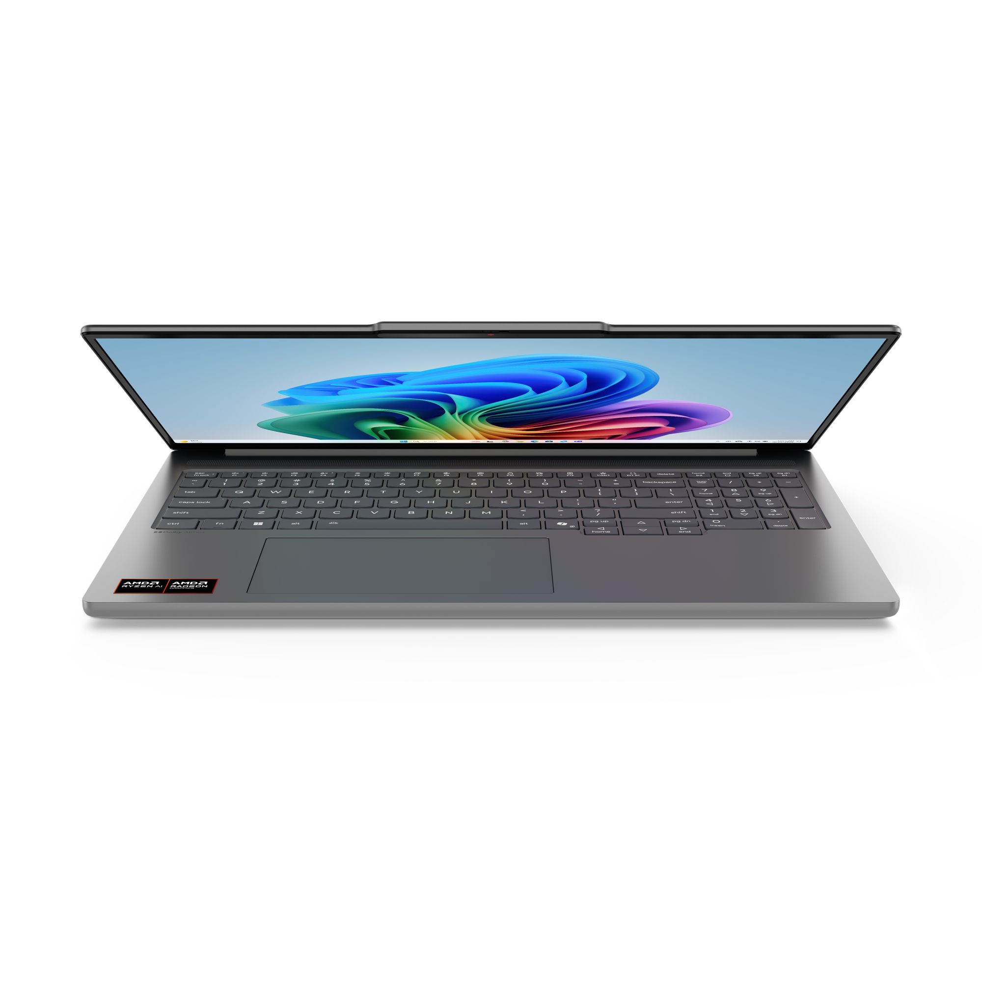 Ein offener Laptop mit einem bunten Windows-Hintergrund und AMD-Logos.