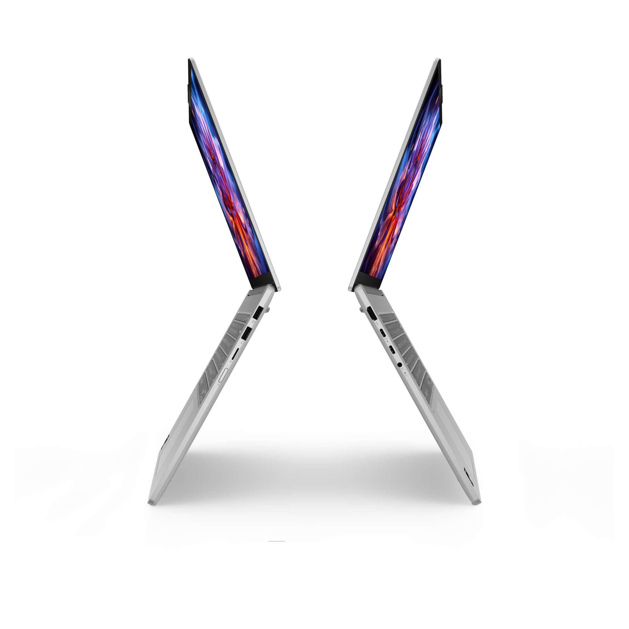 Zwei weiße Laptops mit geöffneten Bildschirmen auf schwarzem Hintergrund.