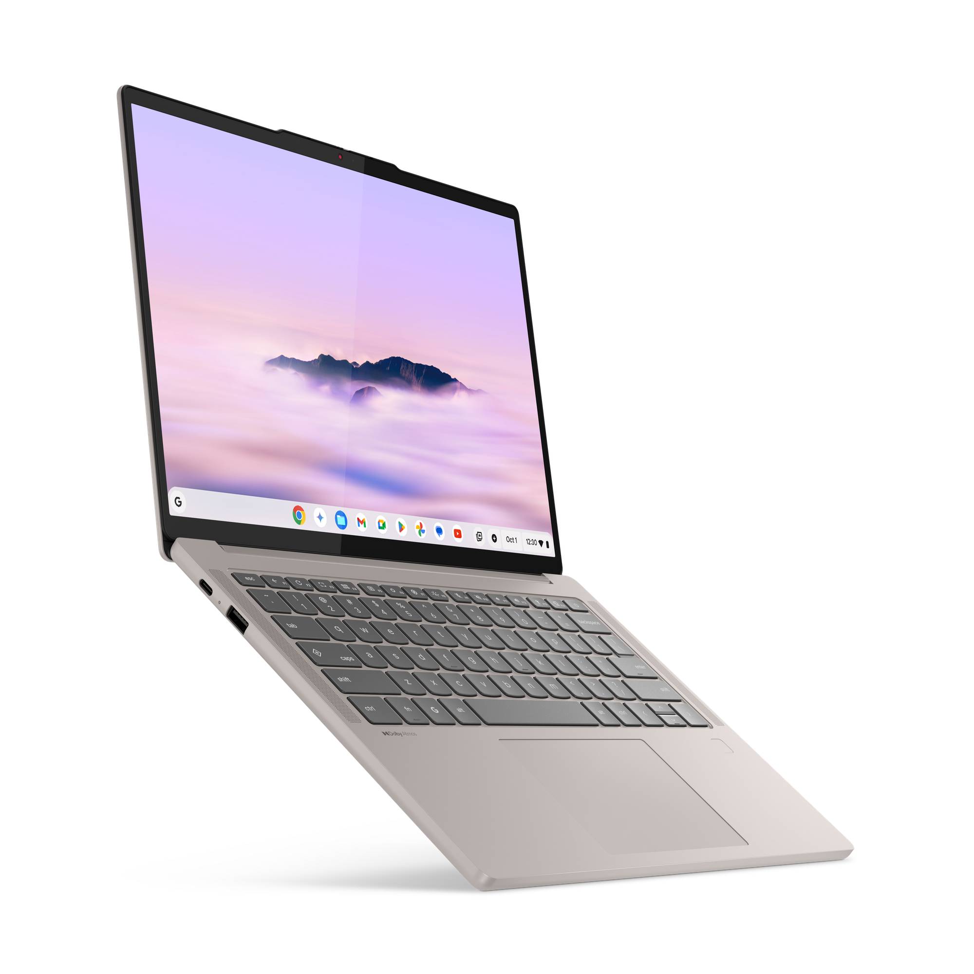 Ein hellgraues Laptop mit einem Bergmotiv auf dem Bildschirm.