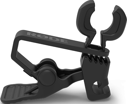 Clip micro noir Rode avec dents et boucle, sur fond noir.