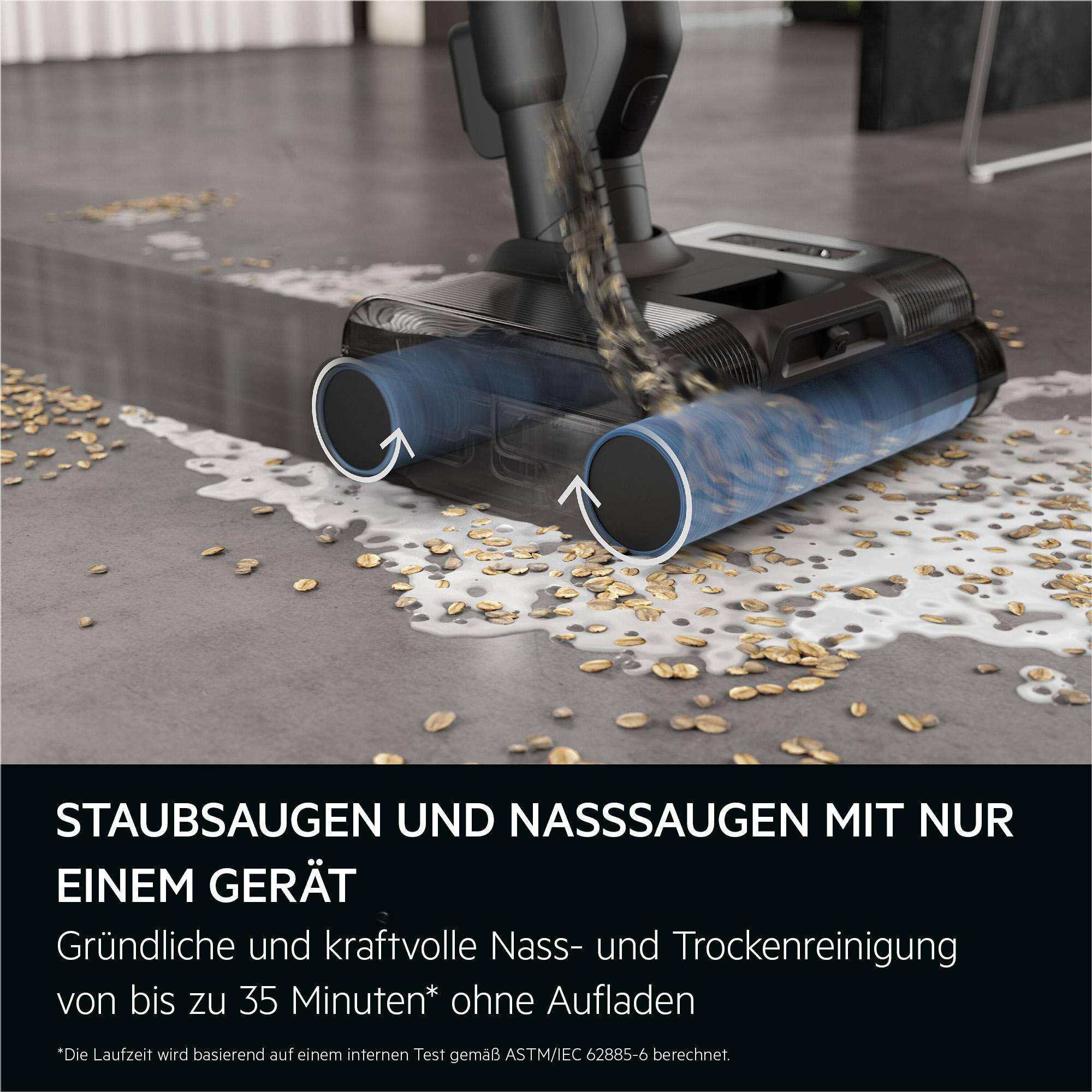 Ein Nass- und Trockensauger reinigt Haferflocken und Flüssigkeit vom Boden.