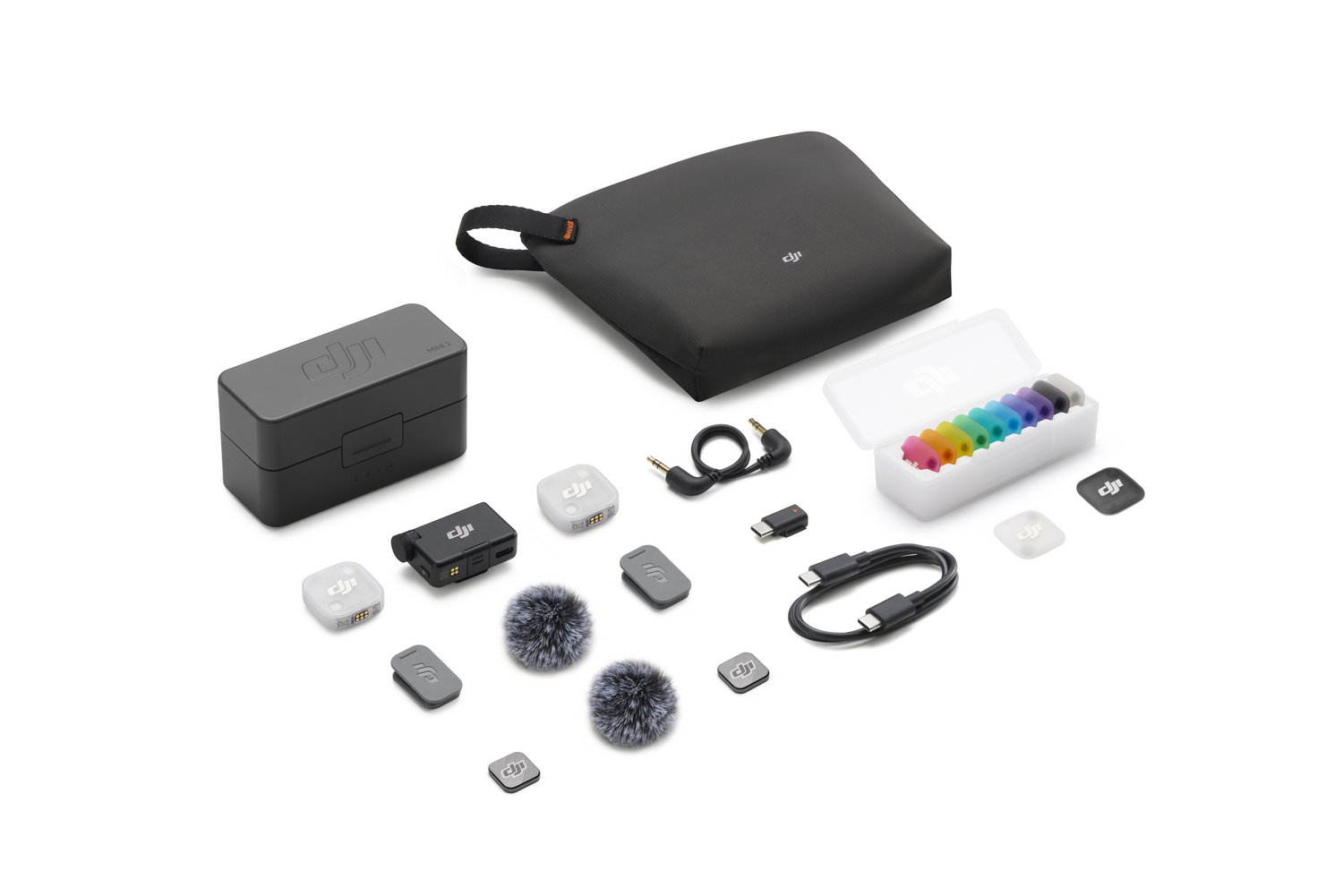Accesorios DJI: estuche de carga, transmisor, parabrisas de micrófono, cables y más.