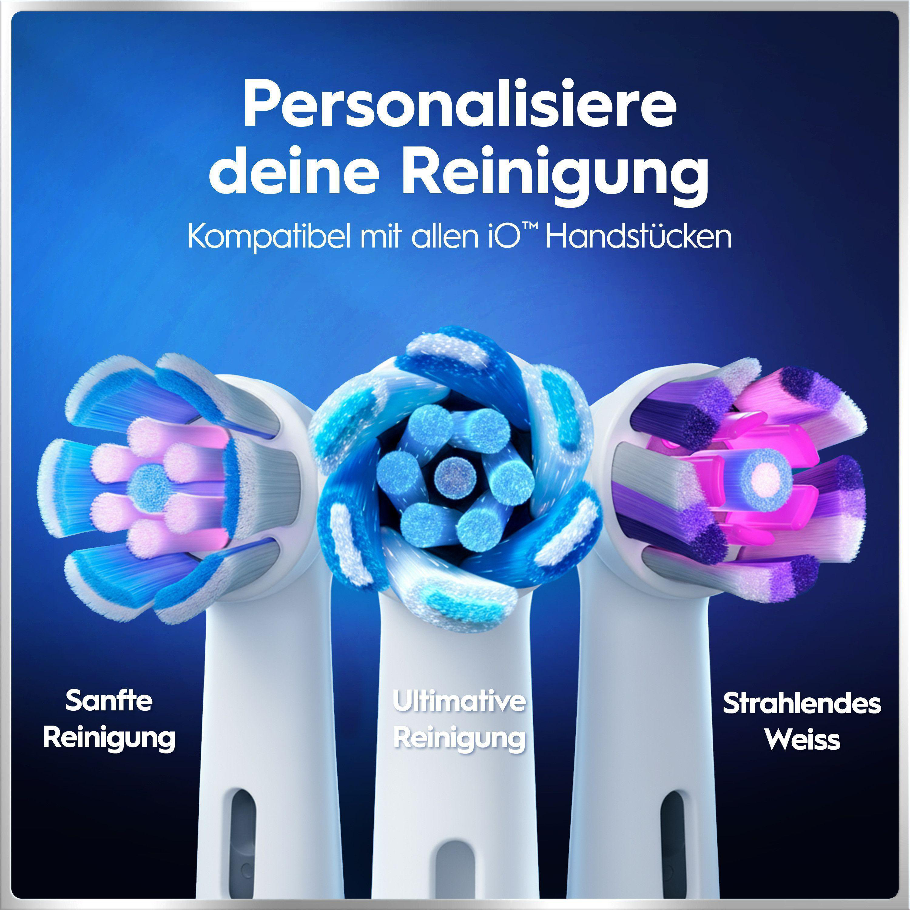 Drei elektrische Zahnbürstenköpfe mit blauen, türkisen und violetten Borsten.