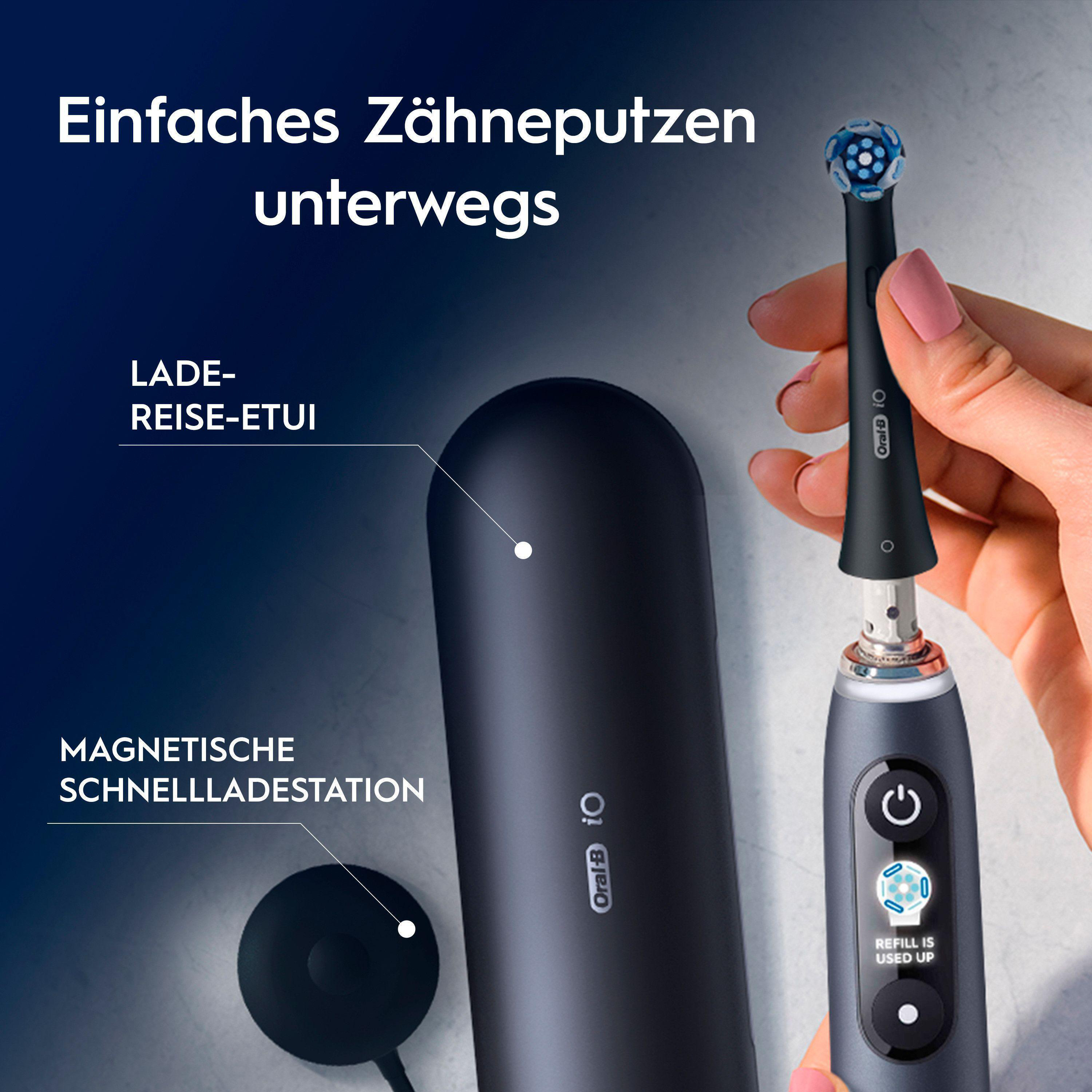Elektrische Zahnbürste mit Lade-Reise-Etui und magnetischer Ladestation.