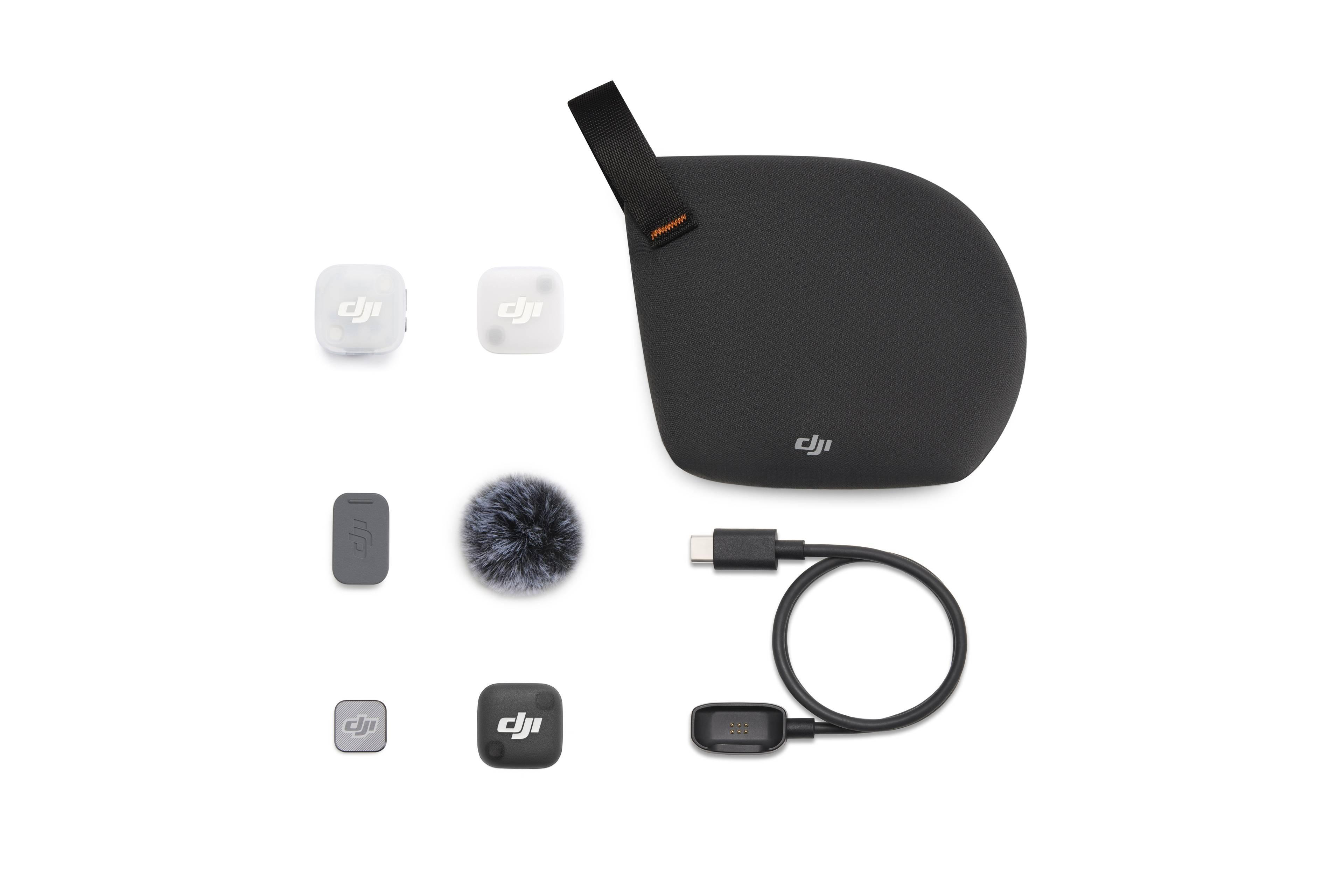 DJI Zubehör: Sender, Mikrofon, Kabel und Tasche auf weißem Hintergrund.
