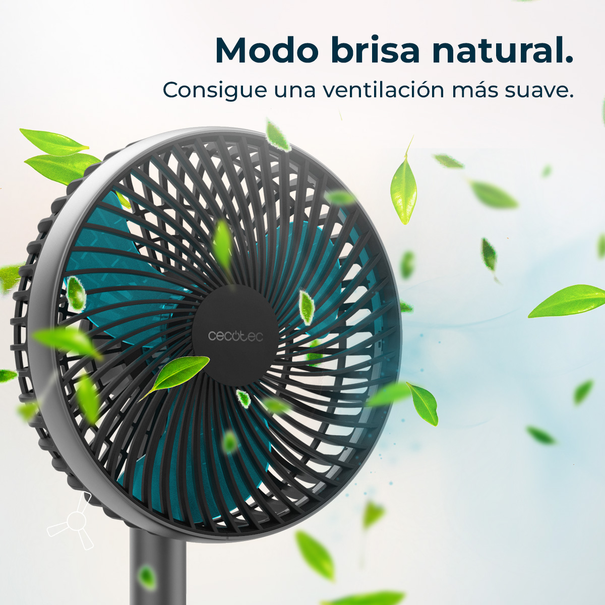 Un ventilador negro con aspas turquesas, rodeado de hojas verdes flotantes.