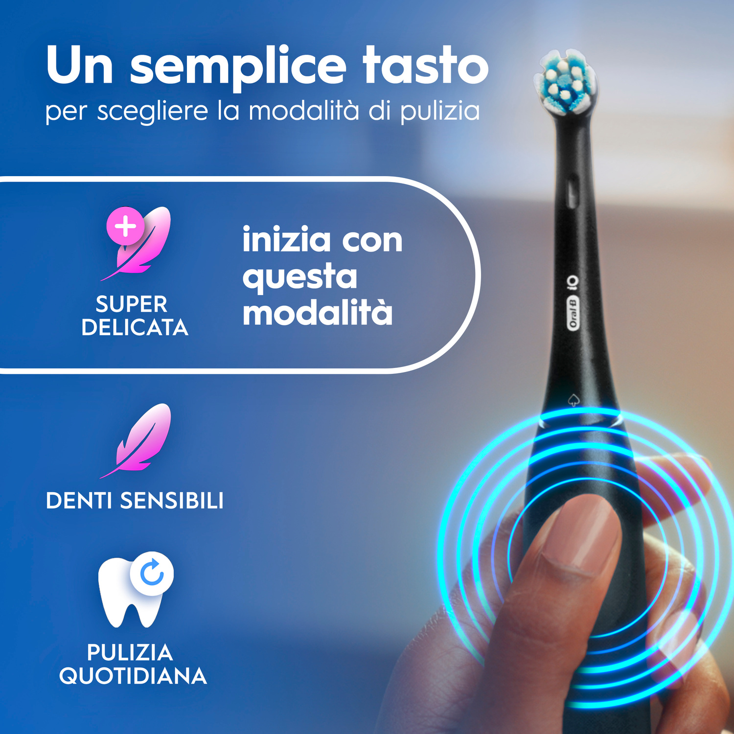 Primo piano di uno spazzolino nero con anelli blu che indicano le modalità di pulizia.