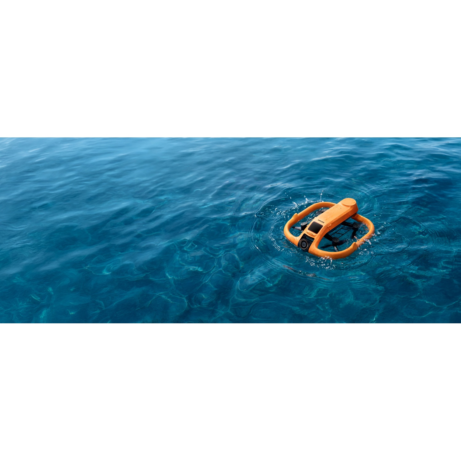 Un subacqueo RC subacqueo arancione galleggia sull'oceano blu.