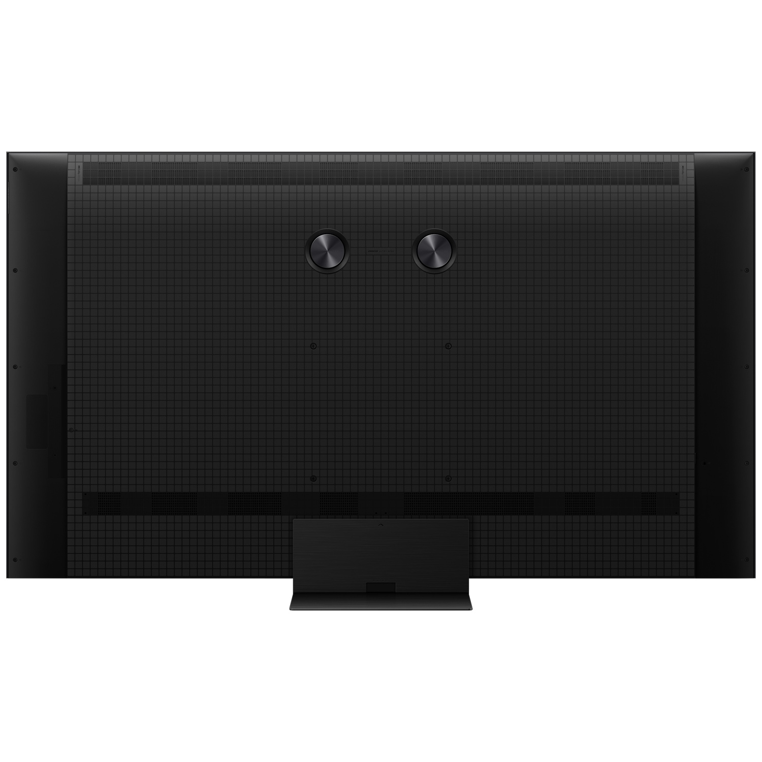 Back of a black TV with a honeycomb pattern and two round knobs.
