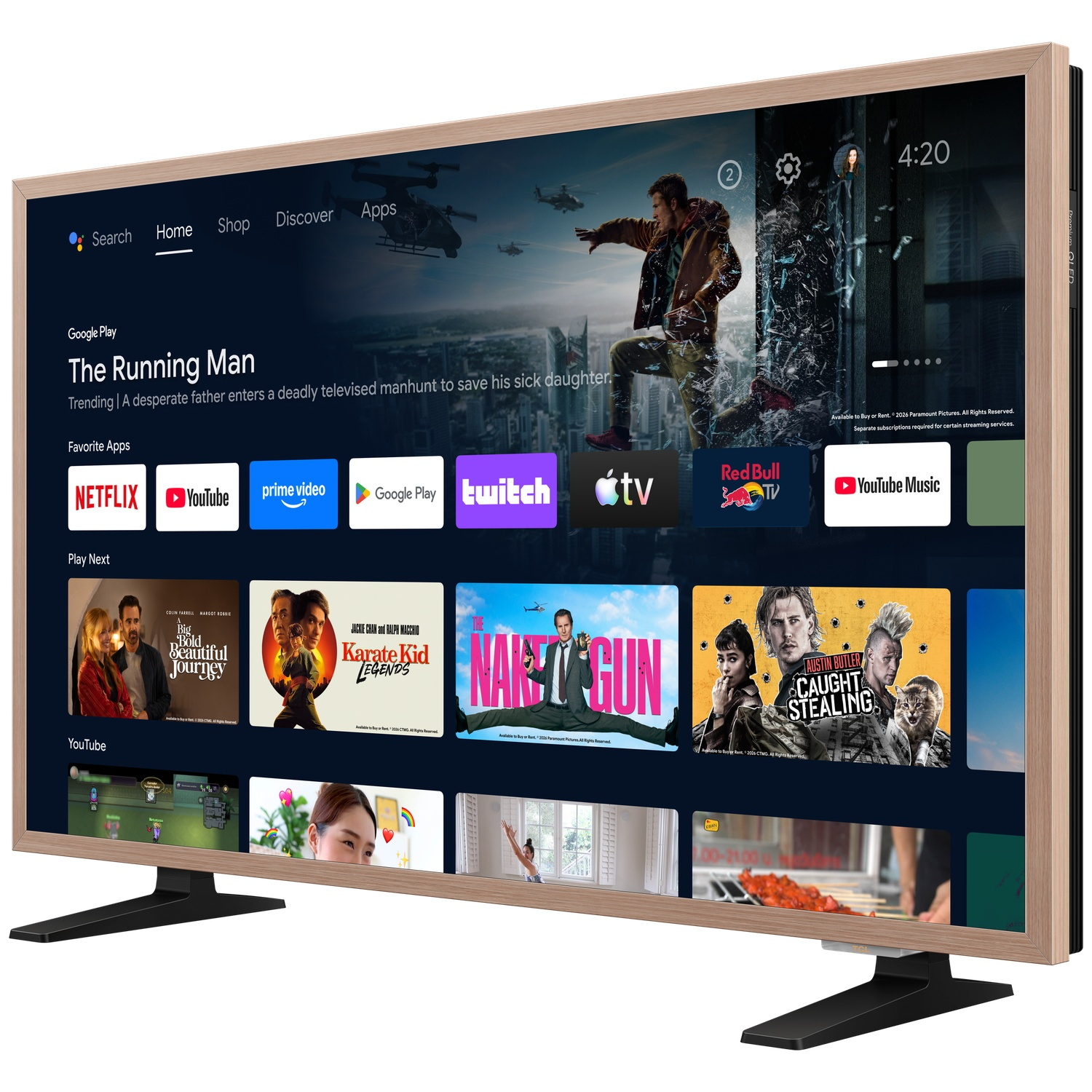 Een televisie toont een smart TV-interface met film- en app-voorbeelden.
