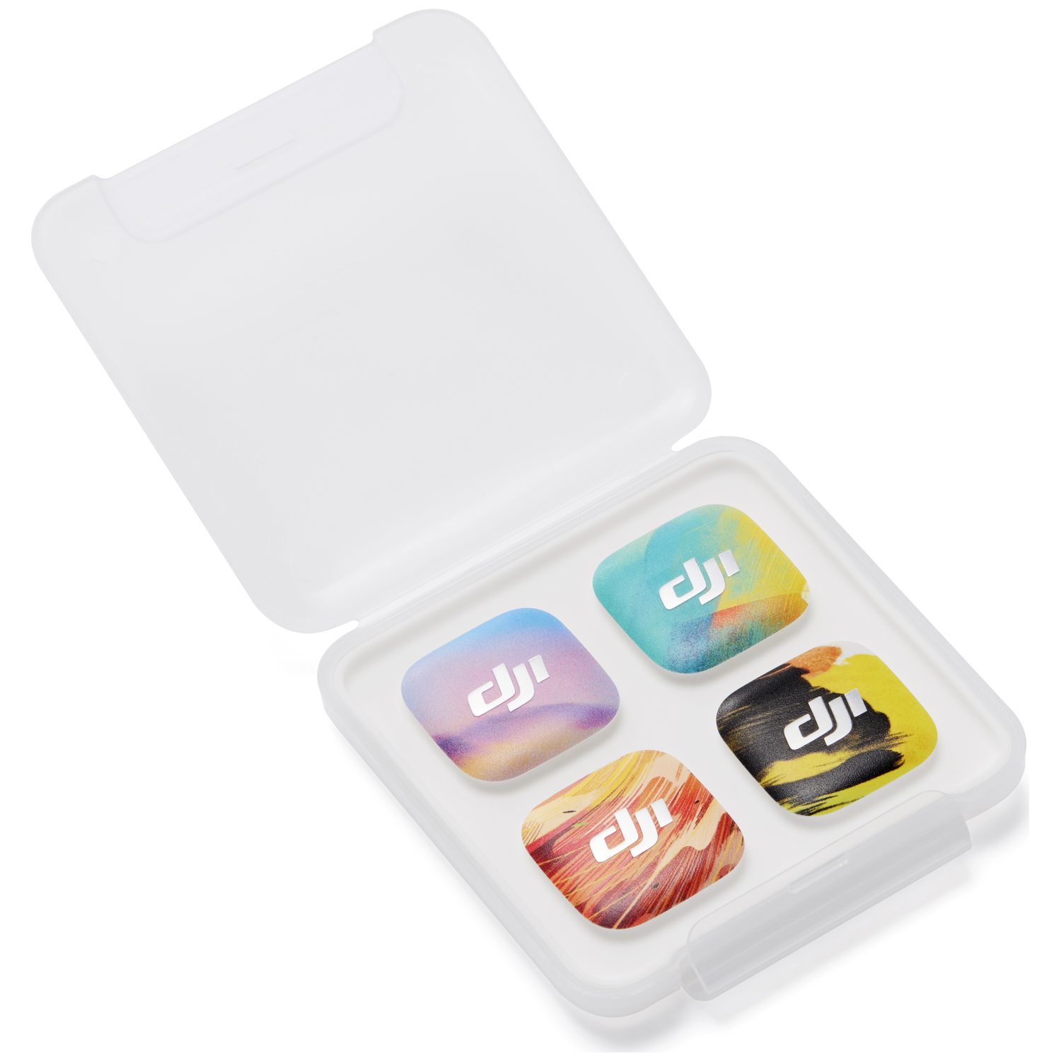 Vier DJI-stickers met kleurrijke patronen in een wit doosje.