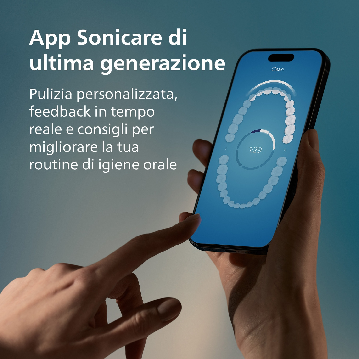 Una mano tiene uno smartphone che mostra un'app per la cura dei denti con grafico dentale.