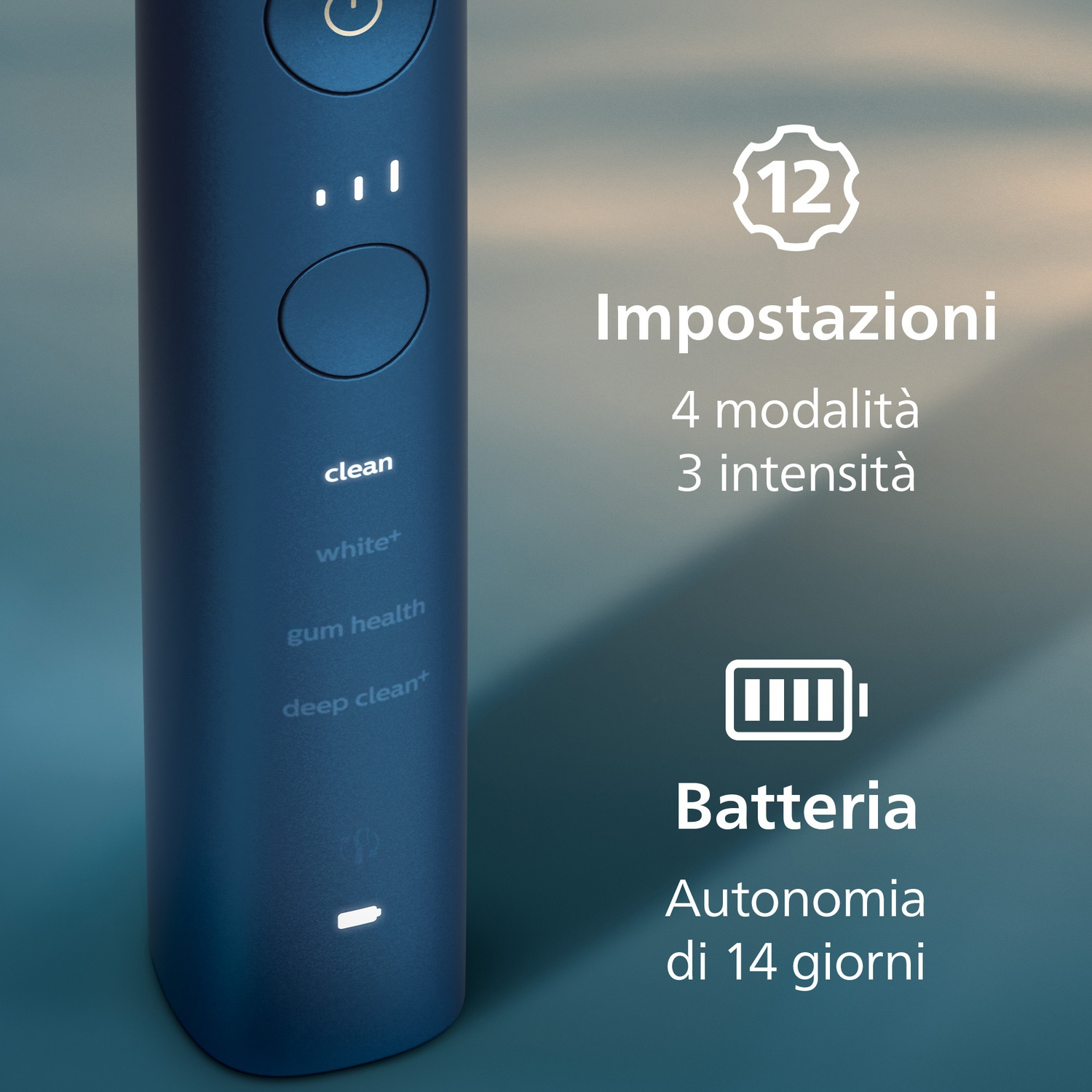 Spazzolino blu scuro con modalità Clean, White+. 12 impostazioni, 4 modalità, 3 intensità. Autonomia 14 giorni.