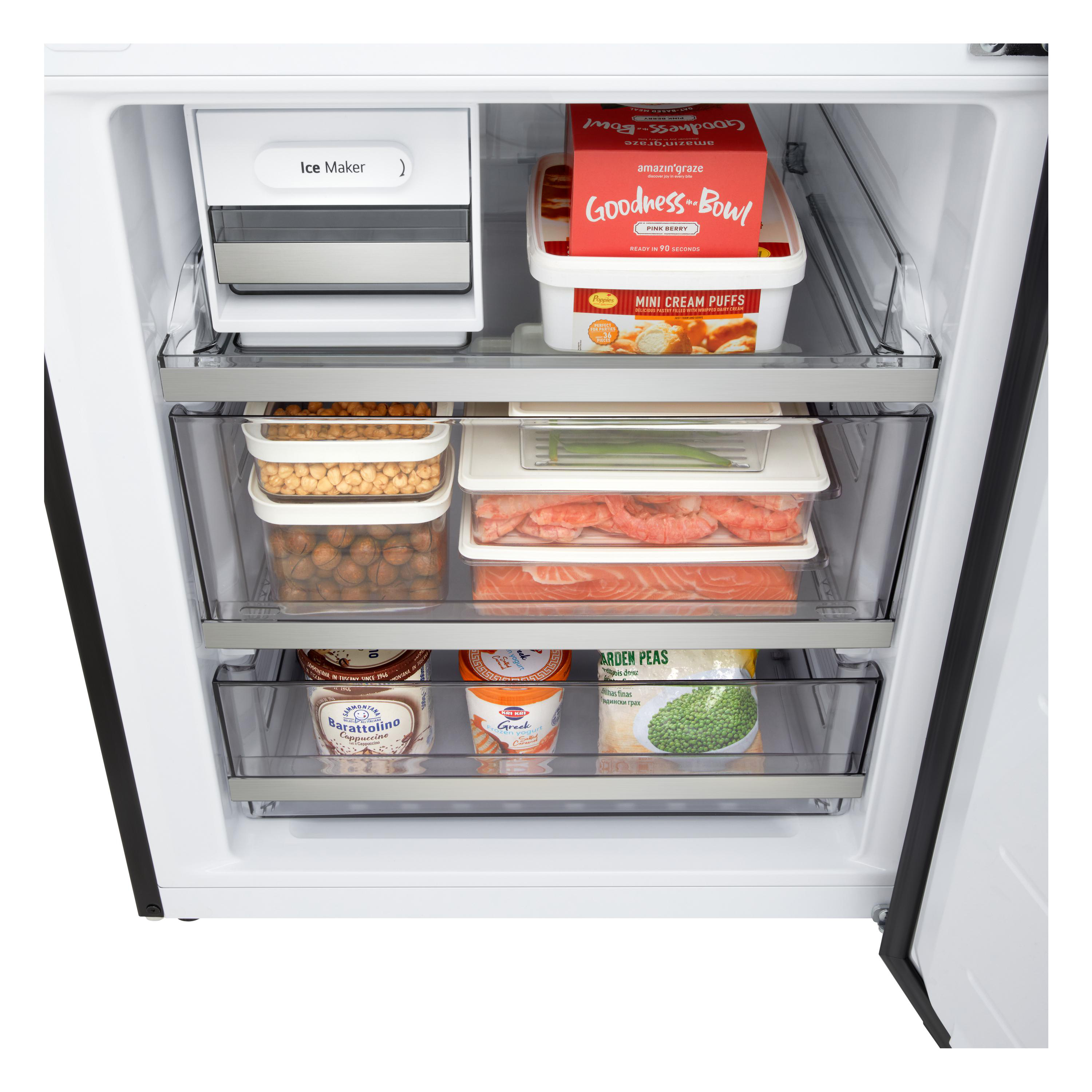 Kühlschrank mit Eiswürfelbereiter, Schale mit Beeren-Mahlzeit, Sahne, Garnelen, Lachs und Erbsen.