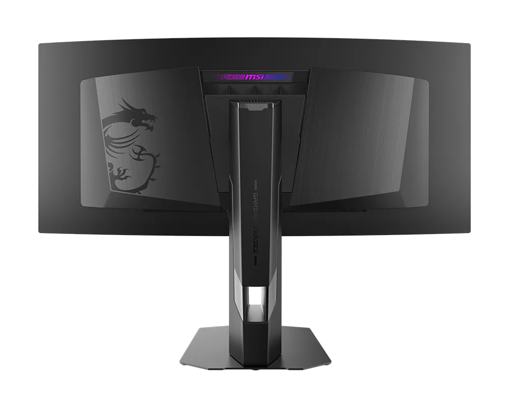 Egy fekete MSI ívelt gamer monitor hátulja sárkány logóval és RGB világítással.