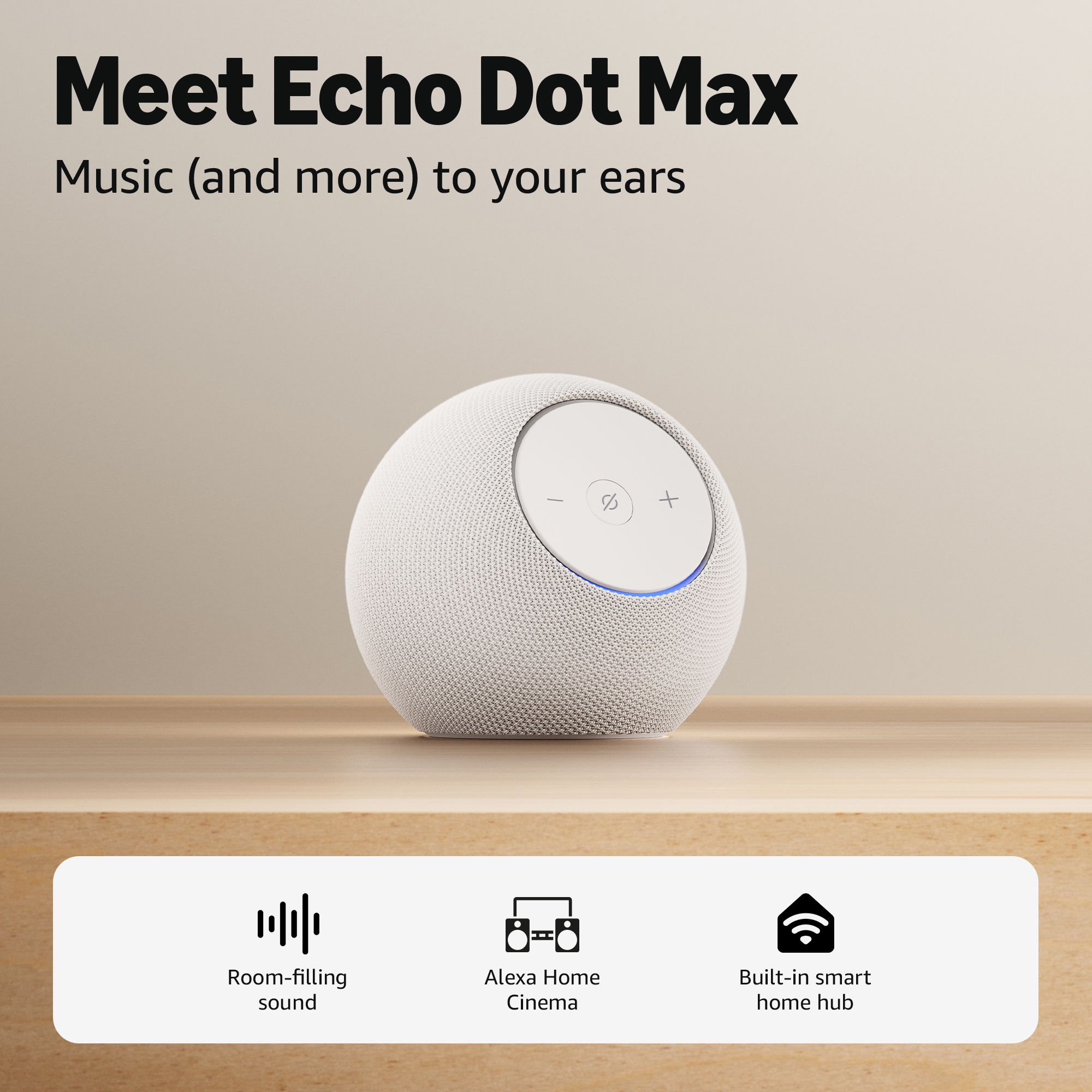 Un haut-parleur Echo Dot Max blanc et sphérique avec une lumière bleue sur une surface en bois.