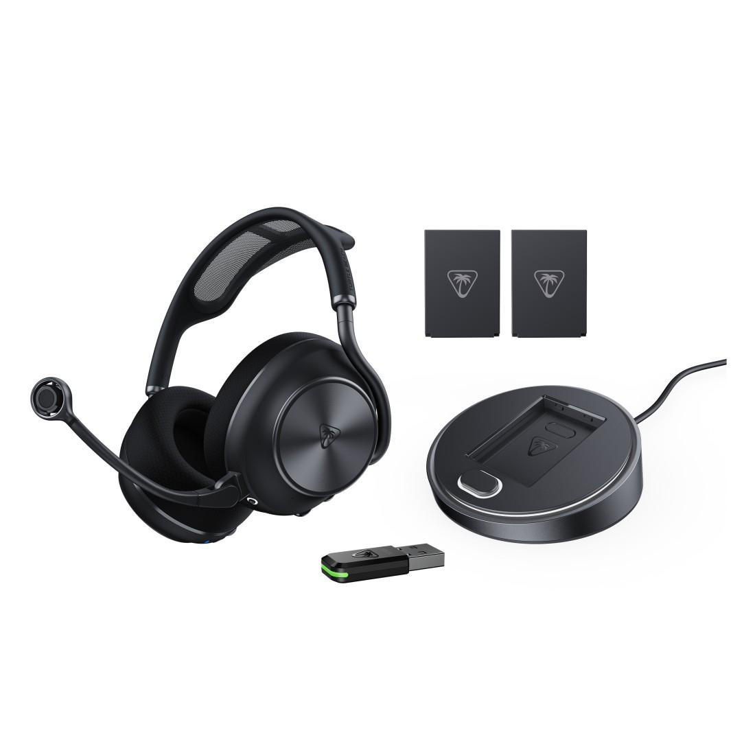 Schwarzes Headset mit Mikrofon, Lade-Dock, USB-Sender und zwei kleinen Boxen.