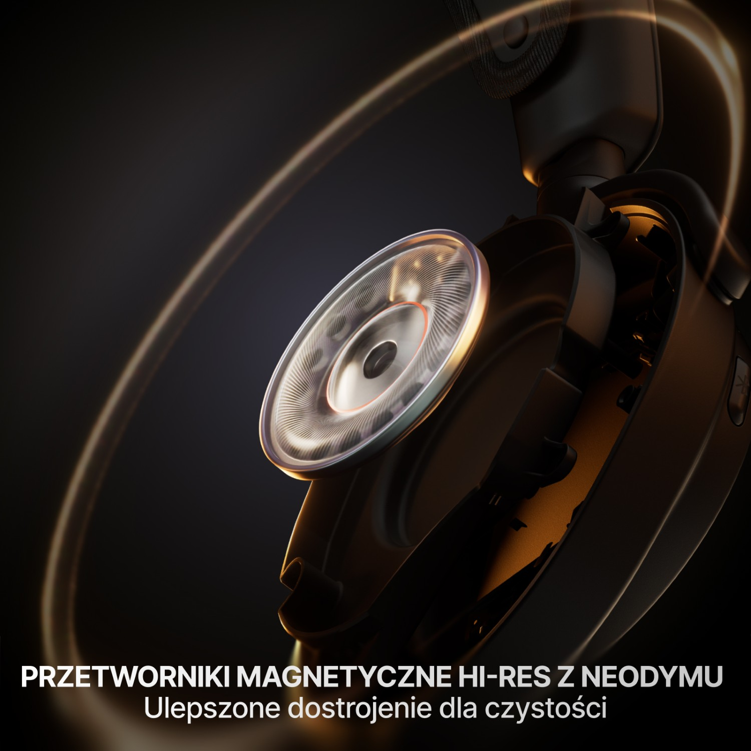 Zbliżenie czarnych słuchawek, skupiające się na przetworniku i złotych pierścieniach światła.