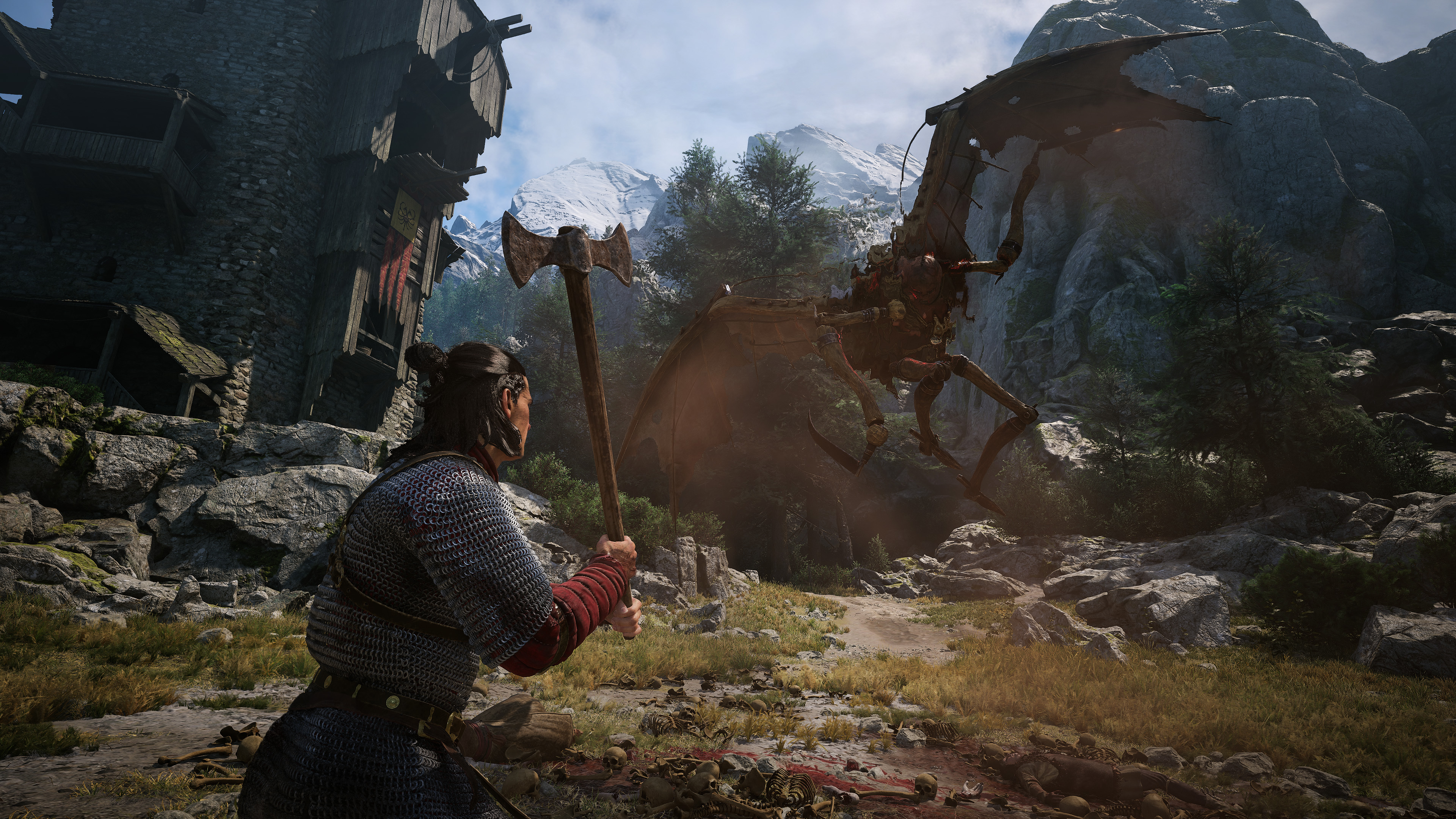 Wojownik z toporem staje przed mechanicznym potworem przed zamkiem i górami.