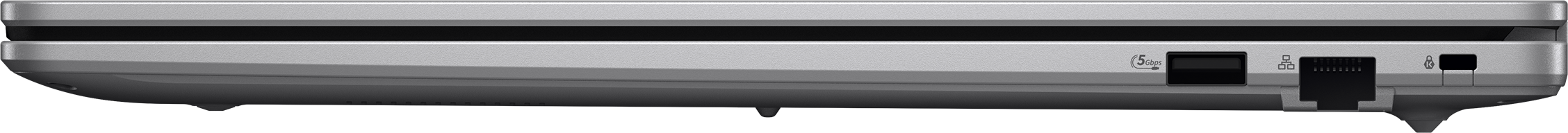 Gros plan du côté d'un ordinateur portable montrant les ports USB et réseau.