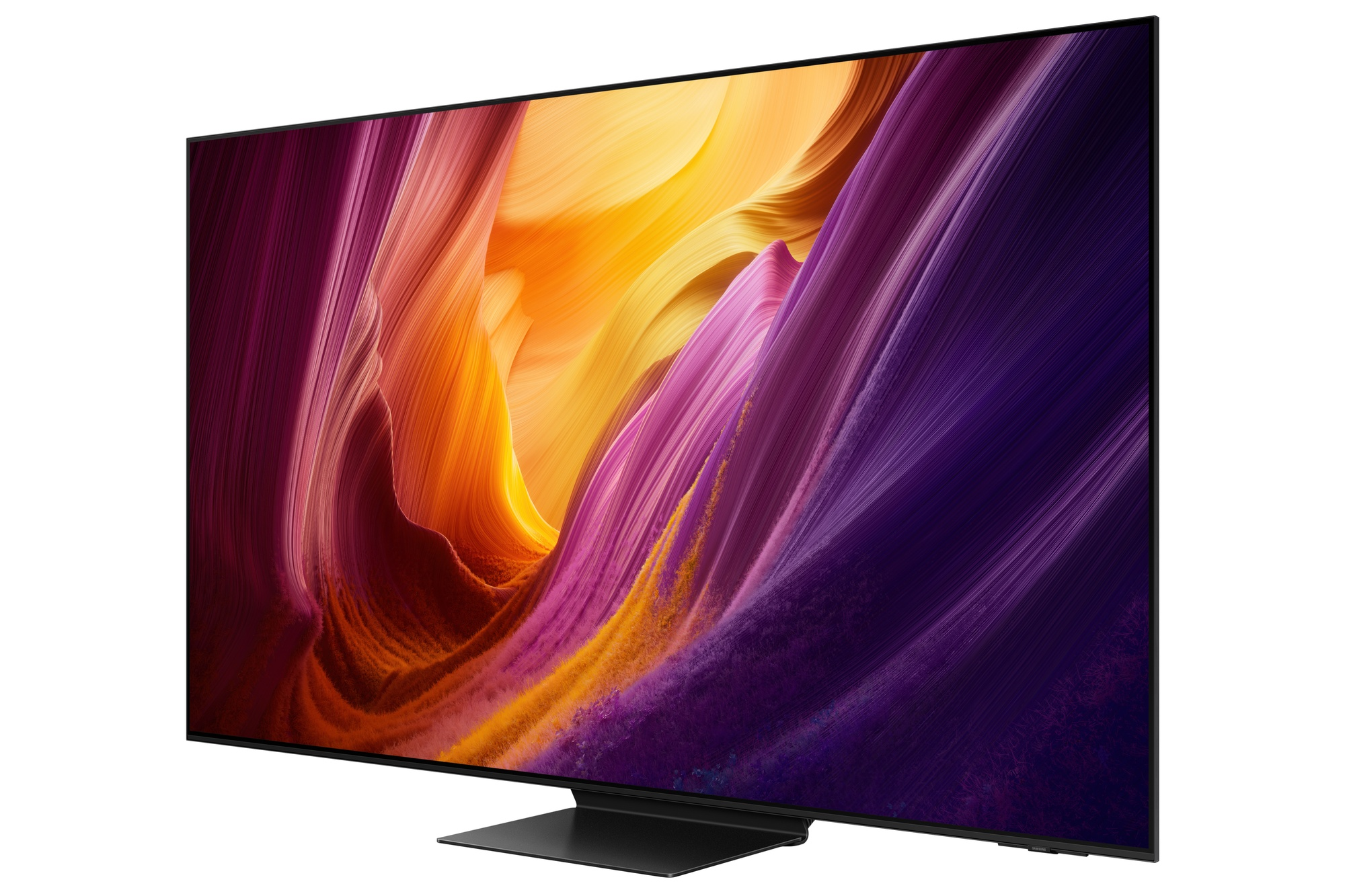 Un televisor moderno que muestra una imagen de fondo abstracta y colorida.