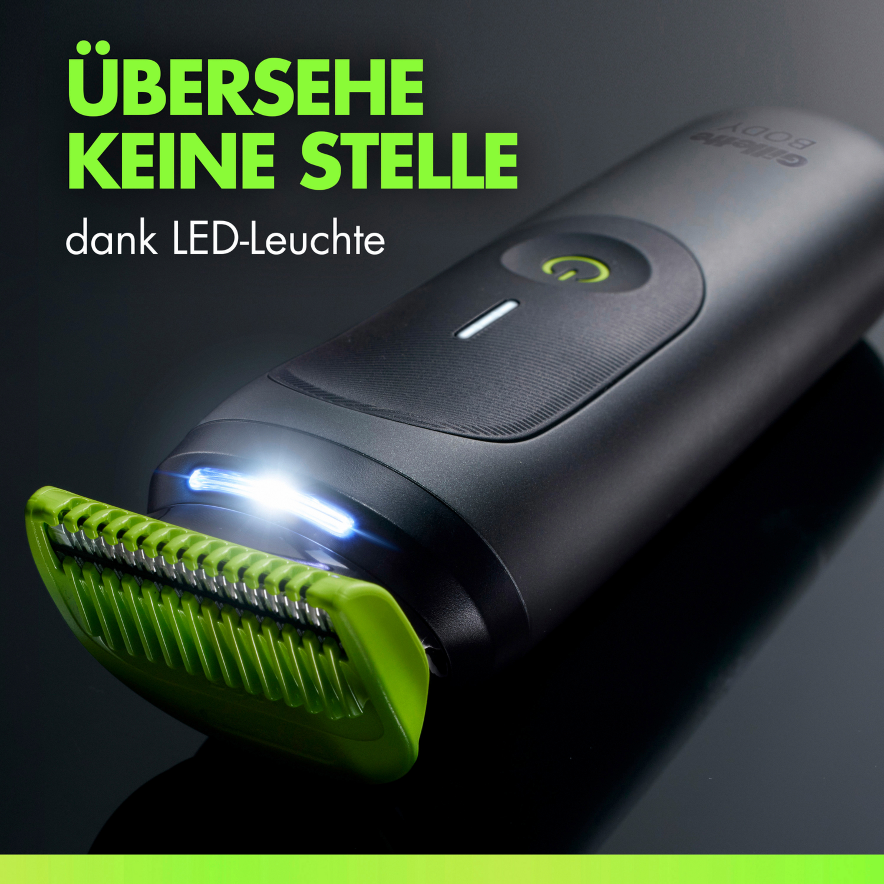 Ein schwarzer Trimmer mit grünem Aufsatz und LED-Licht auf dunklem Grund.