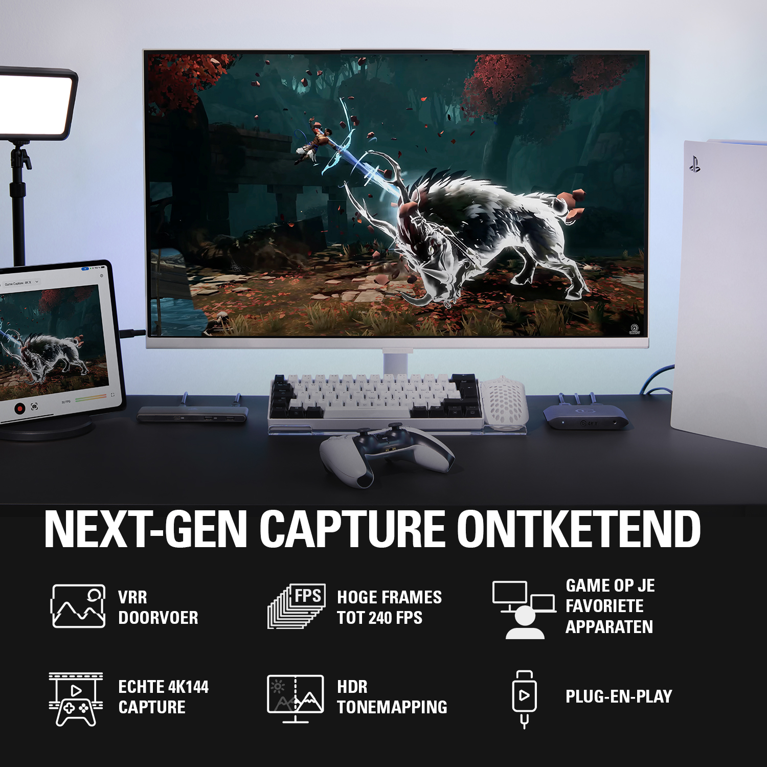 Een gaming setup met monitor, toetsenbord, muis, controller en console.