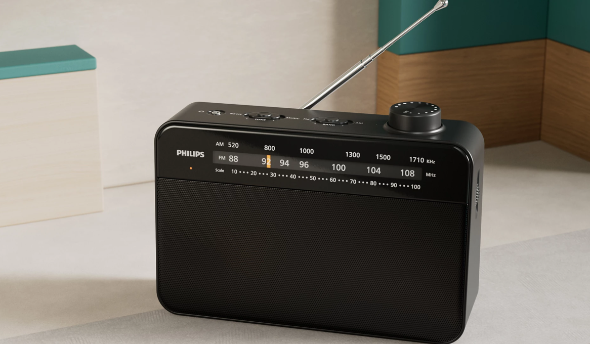 Schwarzer Philips Radio mit ausgefahrener Antenne und Skala.