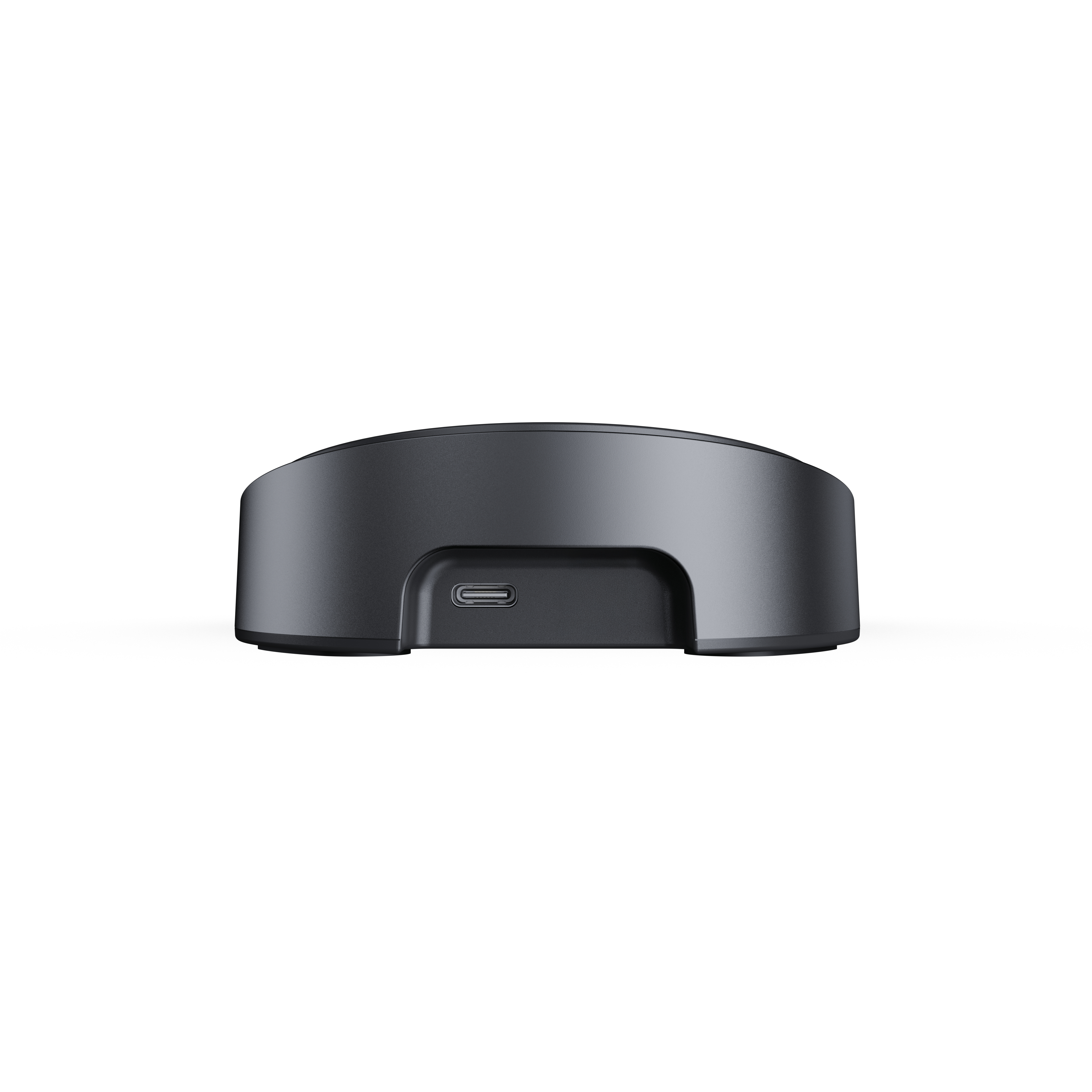 Ein schwarzes, rundes Dock mit einem USB-C-Anschluss.