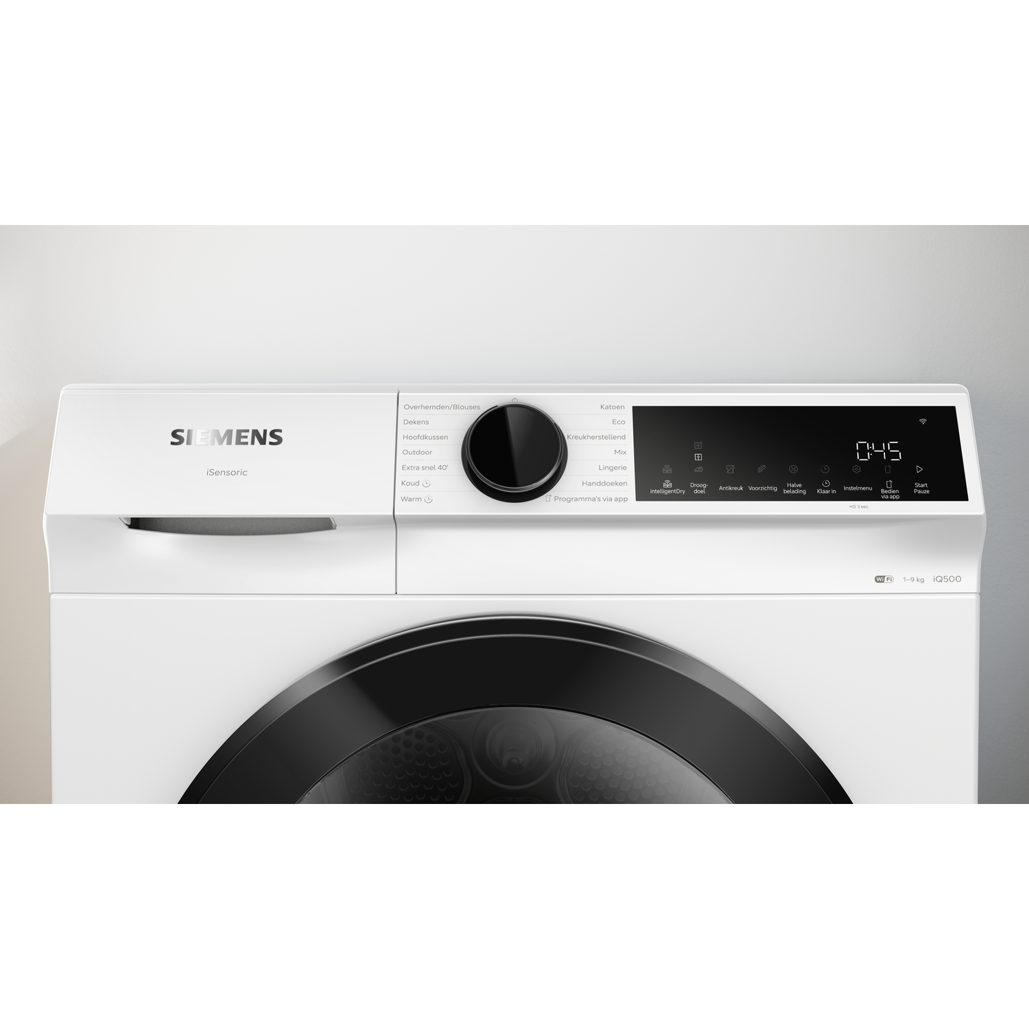 A white Siemens washing machine with a digital display and program selector dial.