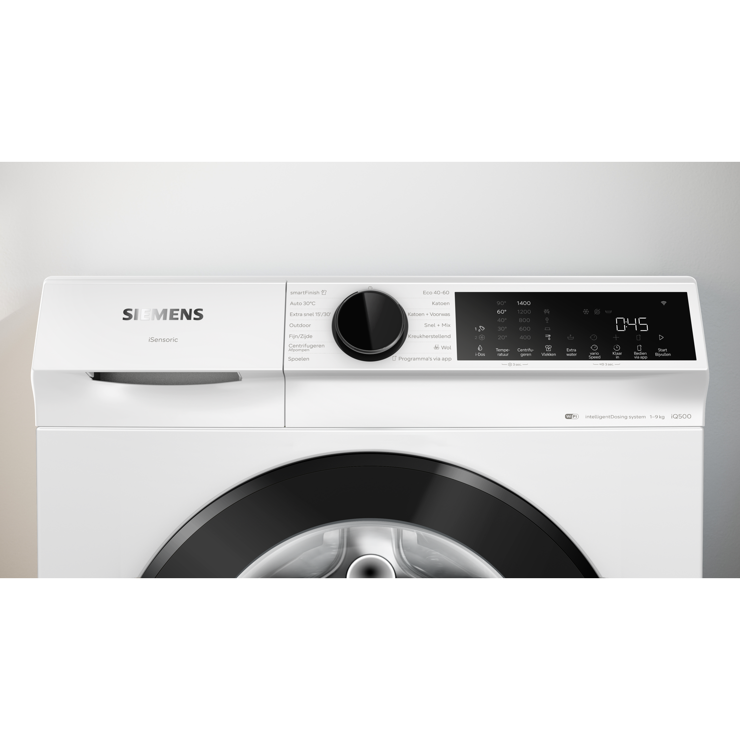 A white Siemens washing machine with a digital control panel and program selection knob.