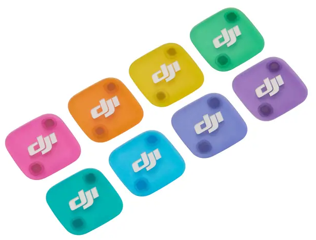 Huit autocollants carrés logo DJI de couleurs vives assorties : rose, turquoise, orange, jaune, bleu, violet, lilas, vert.
