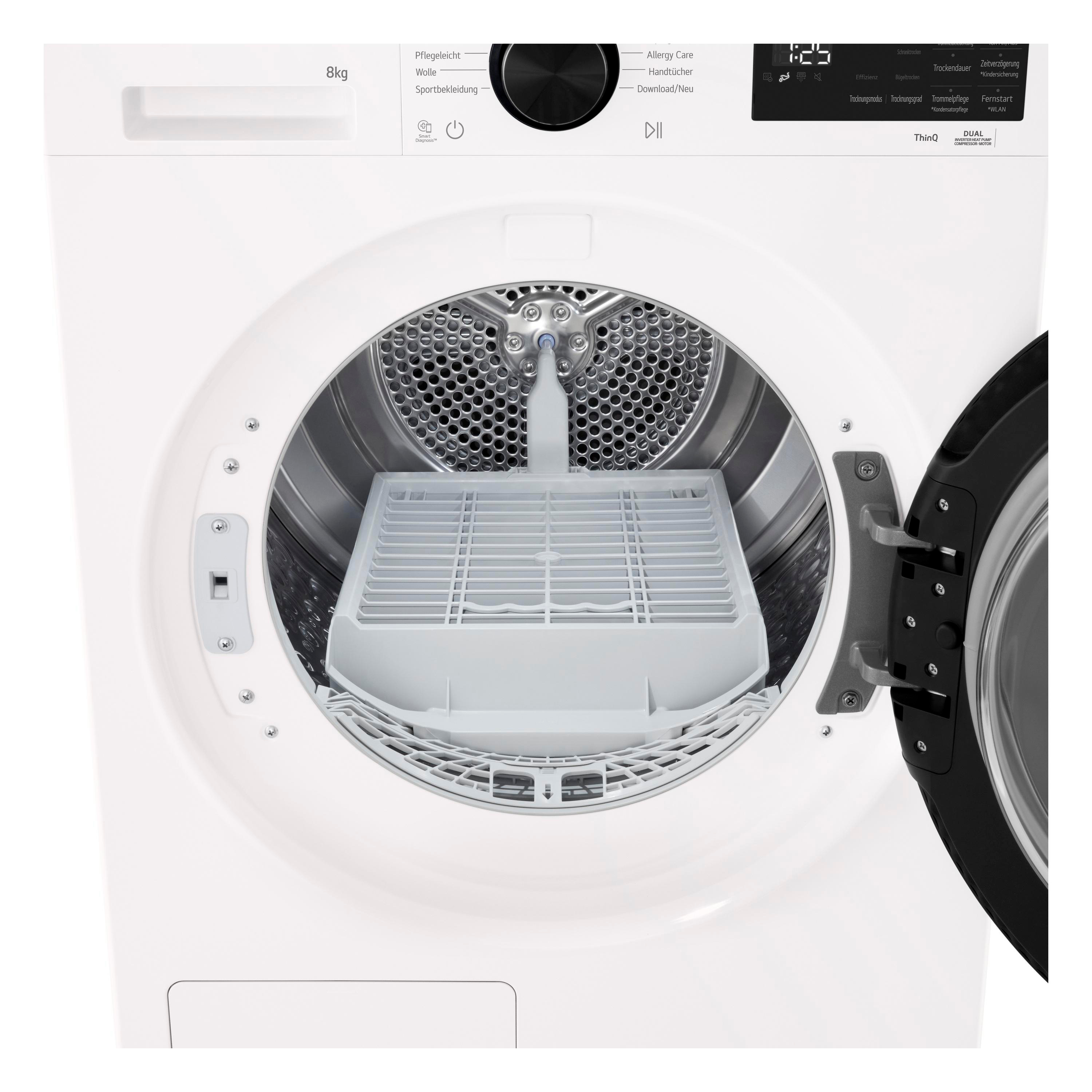 Eine weiße Waschmaschine mit geöffneter Tür und Trommel mit Filter.