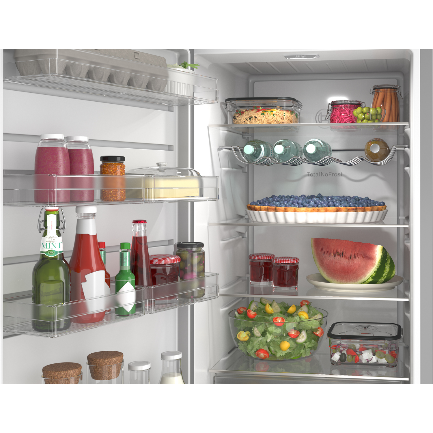 Refrigerator stocked with food: salad, pie, water, fruit, yogurt, eggs.