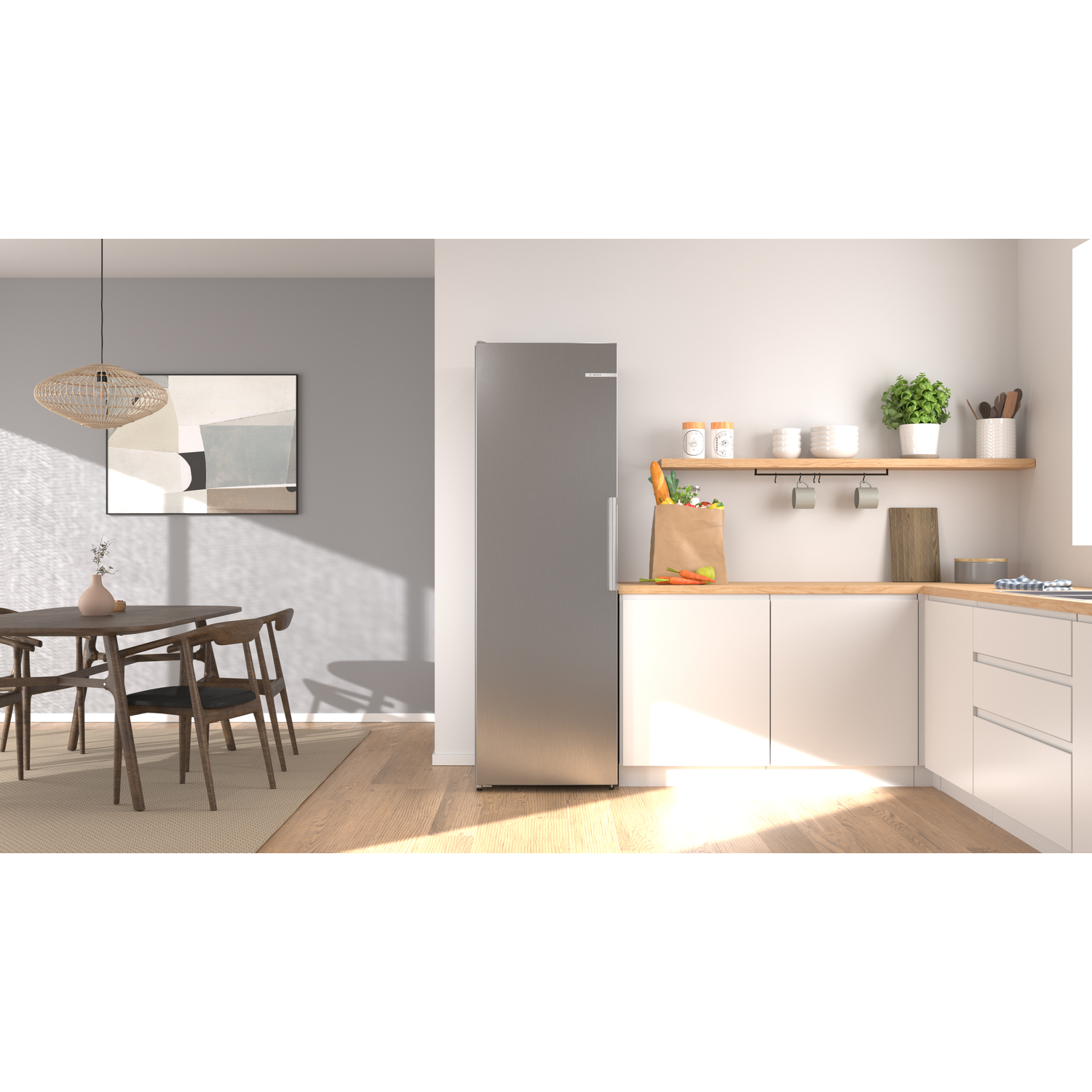 Modern kitchen with dining area: fridge, white cabinets, wood table, chairs, painting.