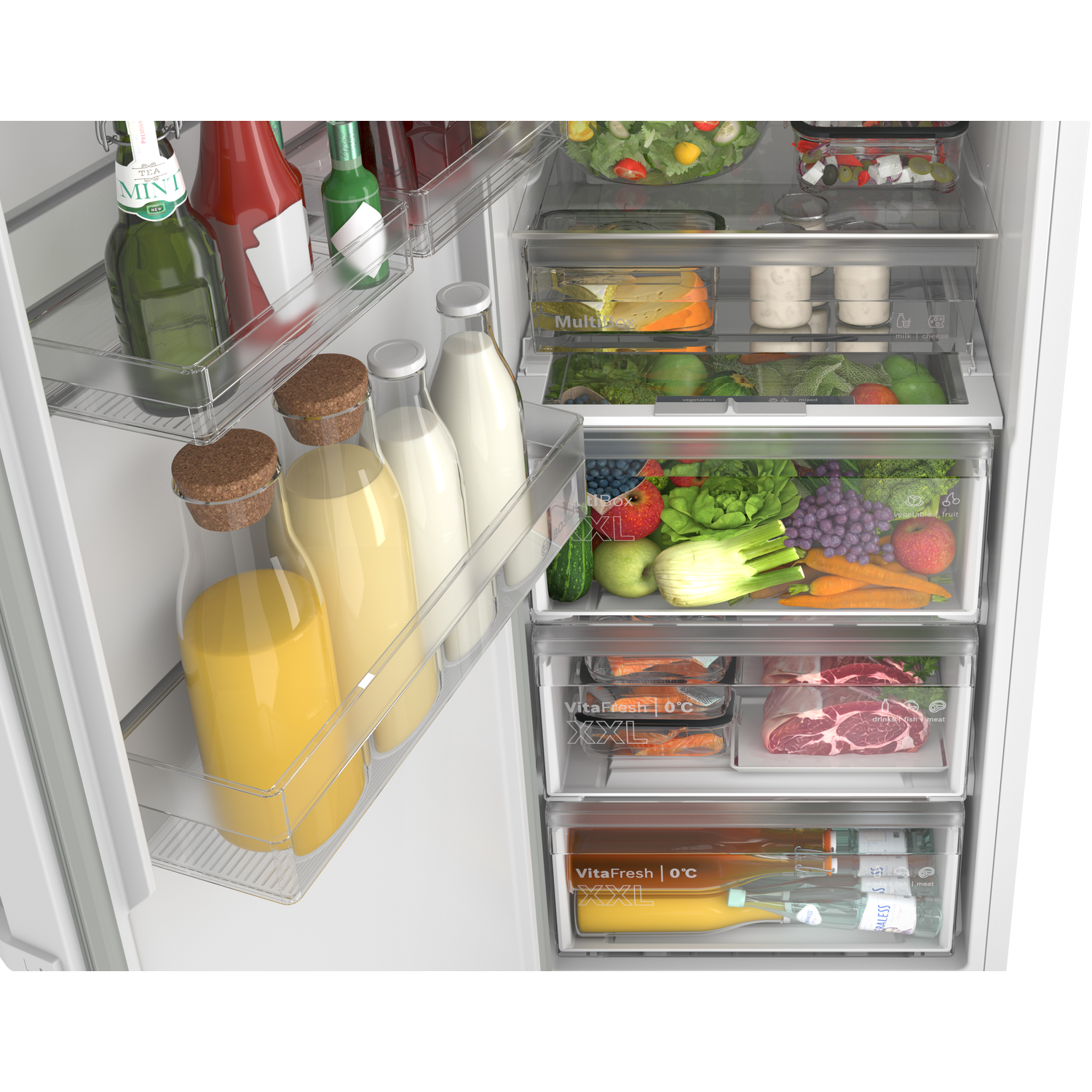 An open refrigerator filled with food like fruits, vegetables, meat, drinks, and milk.