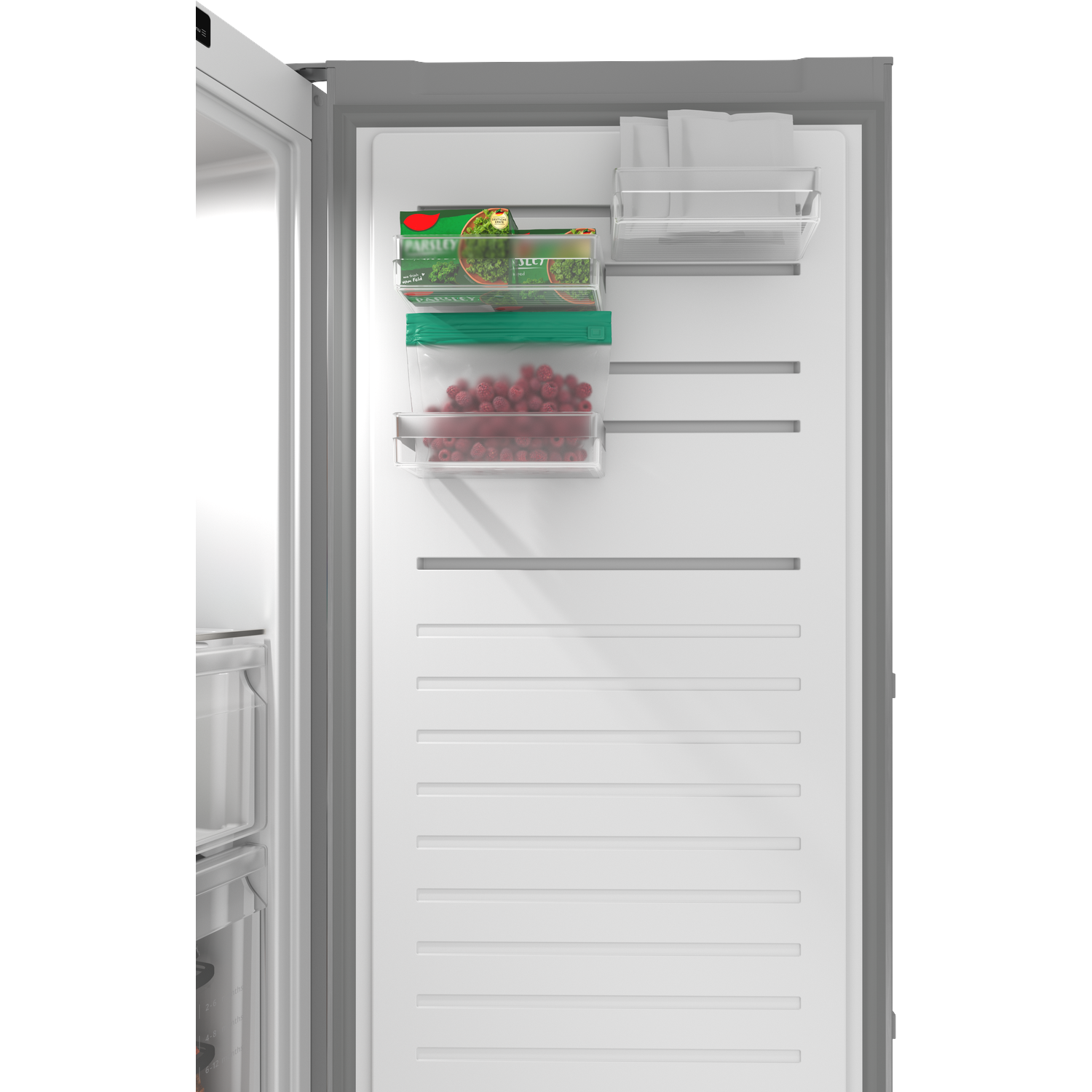 Inside a freezer: clear bins with parsley, raspberries, and other items on shelves.