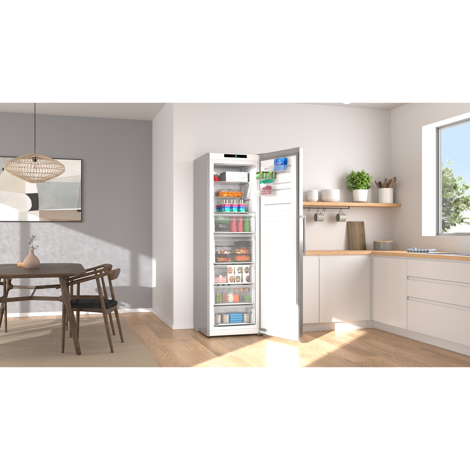 An open white refrigerator stands in a bright kitchen with a dining area.