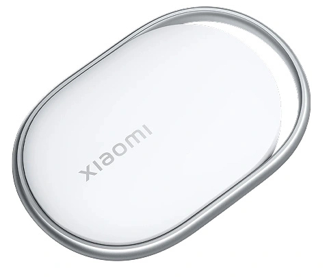 Białe, owalne urządzenie Xiaomi z srebrną ramką na białym tle.