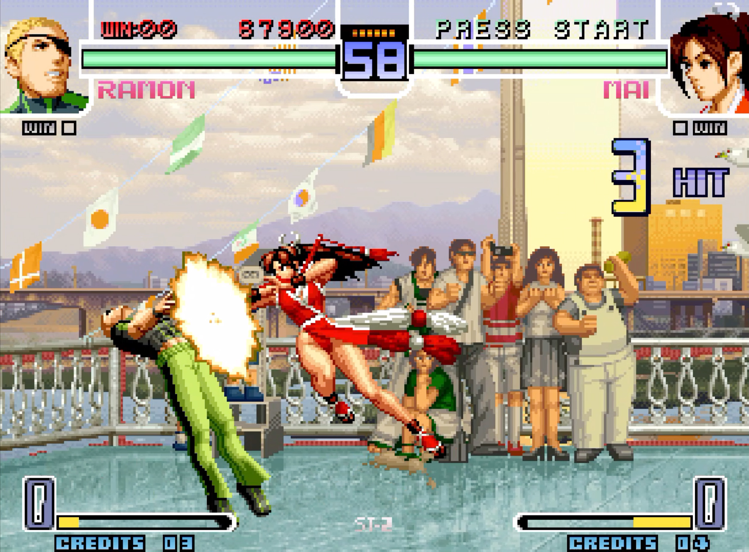 Un jeu de combat avec deux personnages, l'un en rouge, l'autre en vert, au combat.