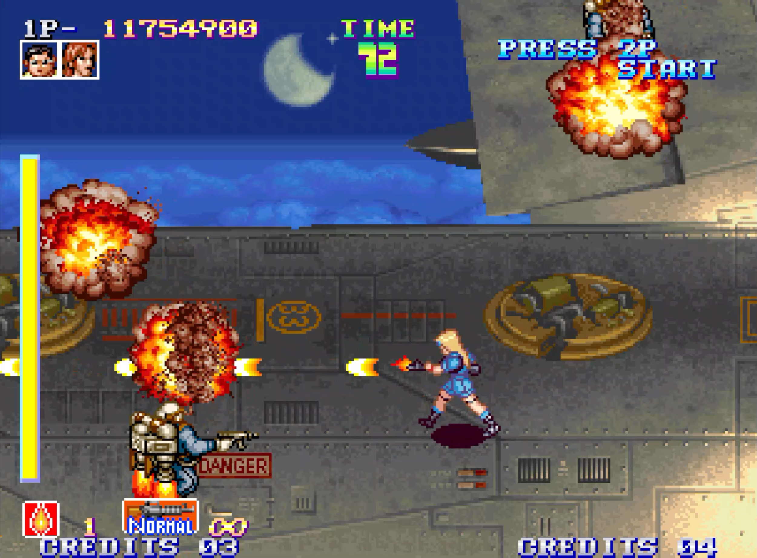 Un jeu d'arcade 2D avec des personnages, des explosions et des affichages texte comme 'TIME 72'.