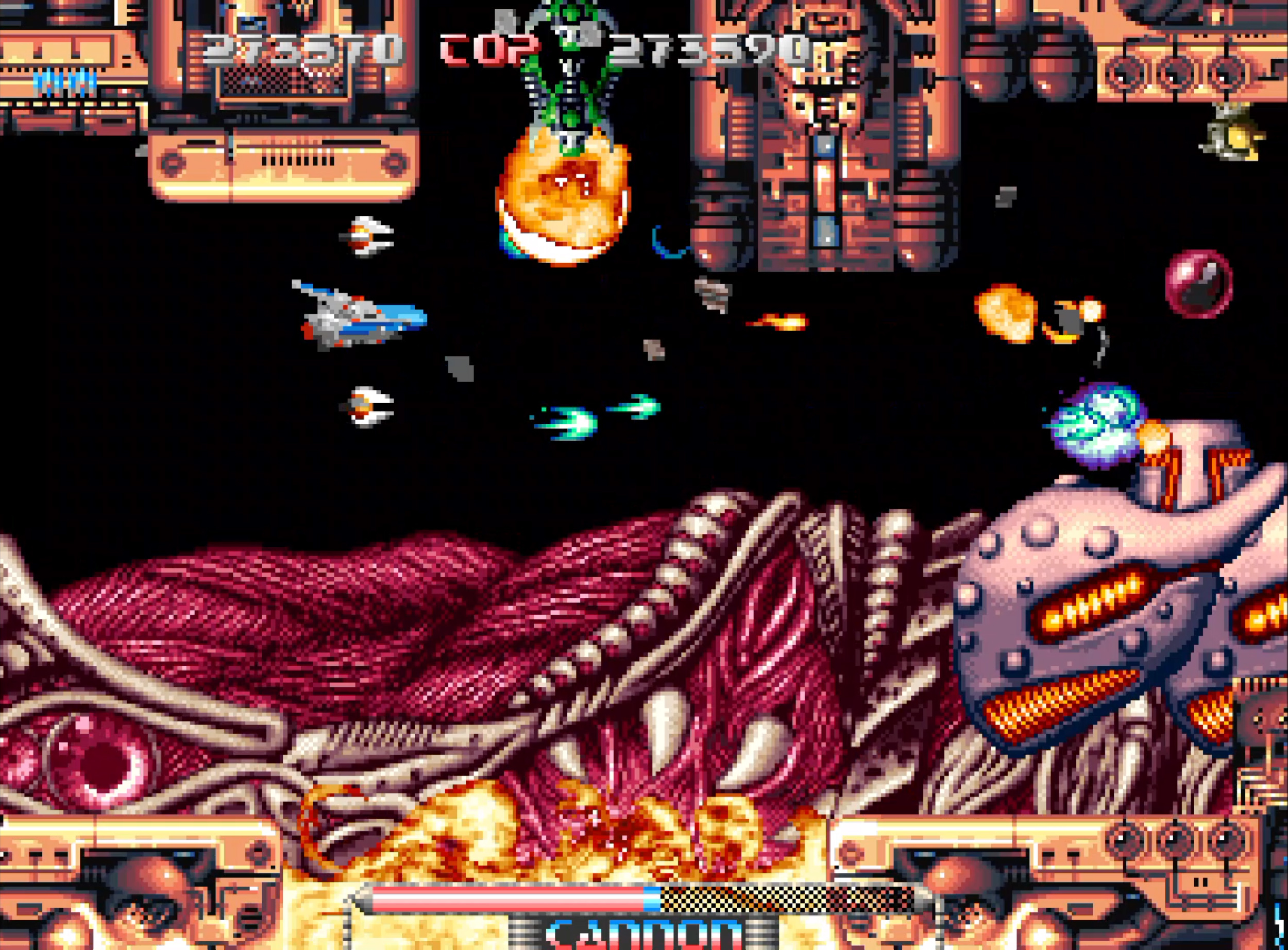 Un jeu de combat rétro futuriste avec des vaisseaux spatiaux, des monstres organiques et des explosions.