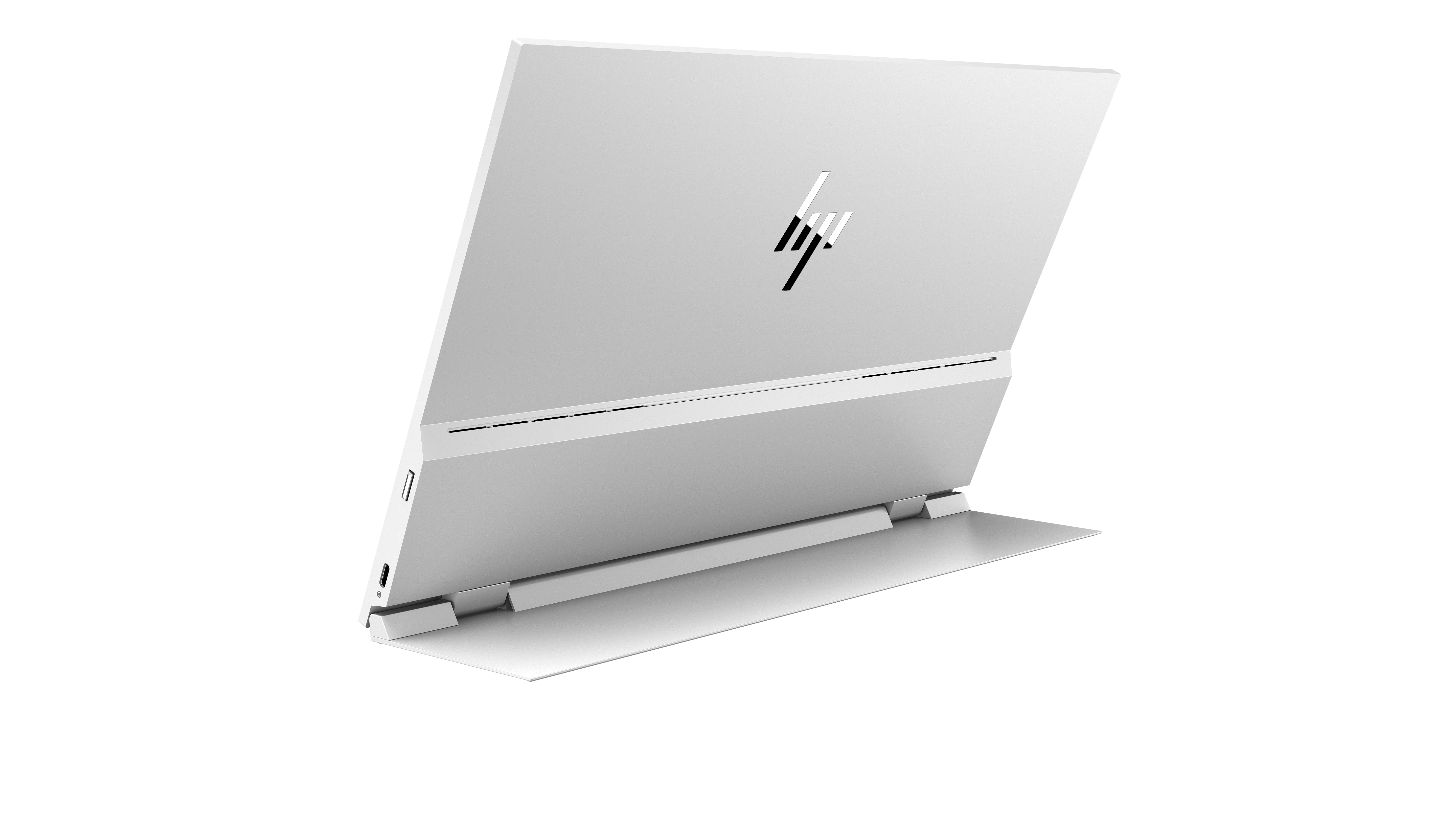 Ein weißer Laptop mit dem HP-Logo, auf schwarzem Hintergrund stehend.