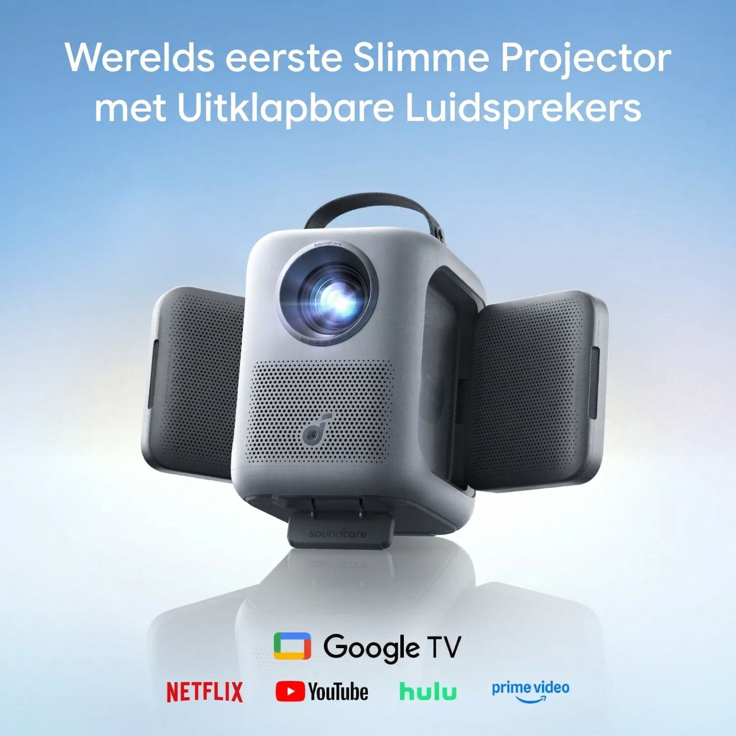 A white Soundcore projector with foldable speakers. Google TV, Netflix, YouTube logos.